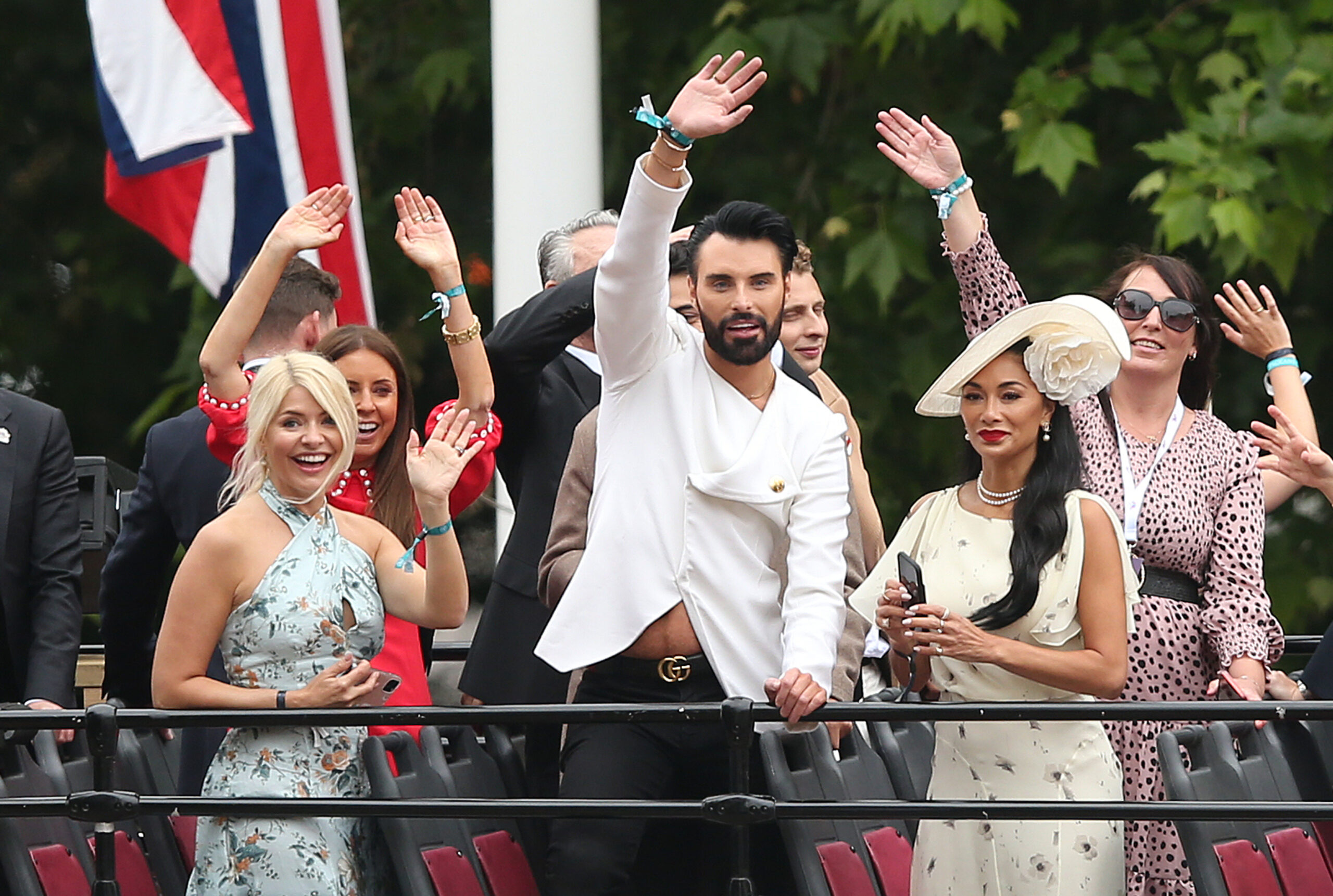Holly, Rylan and Nicole waving on the Platinum Jubilee parade bus