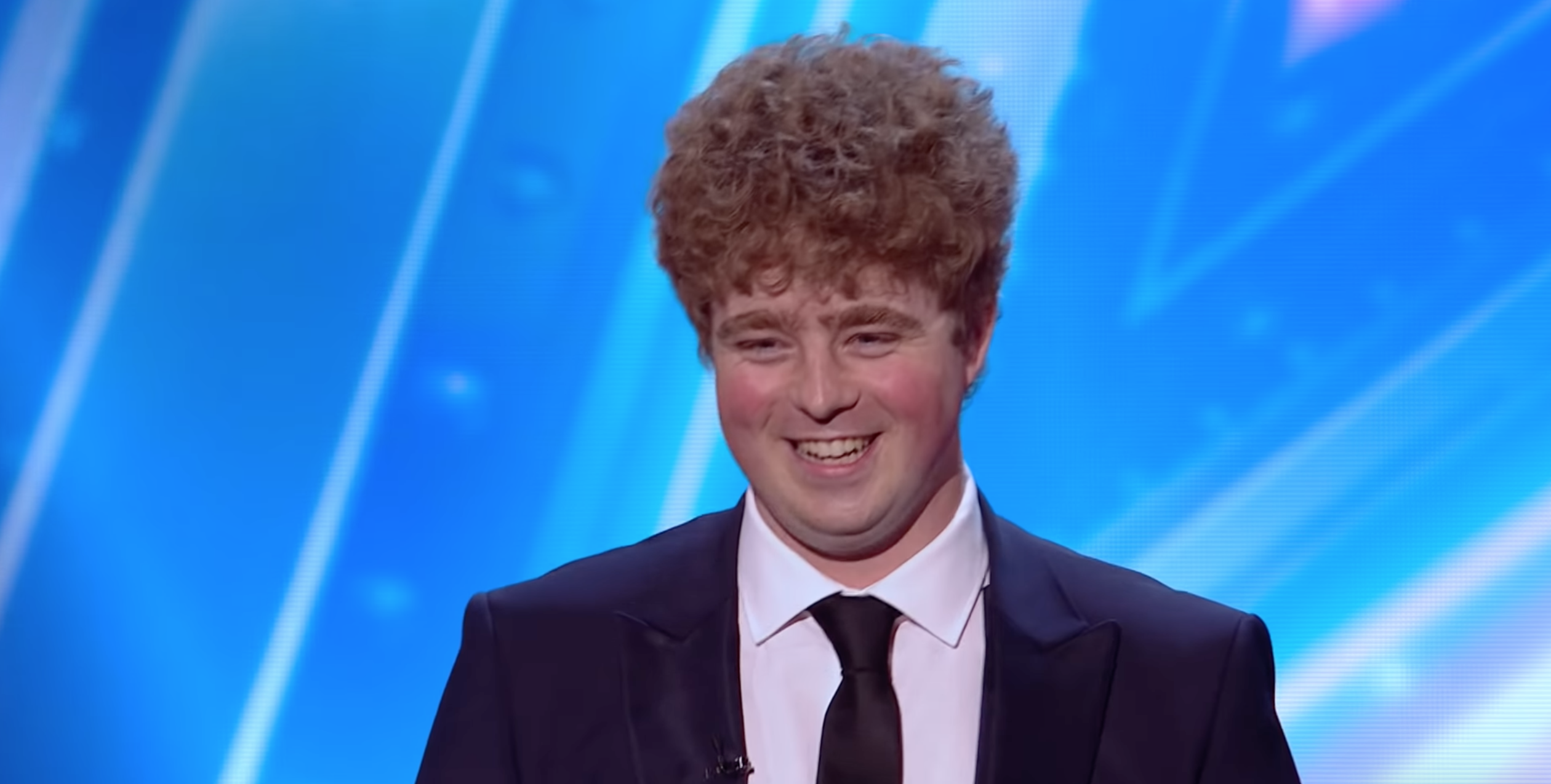 Tom Ball smiling on the BGT 2022 final