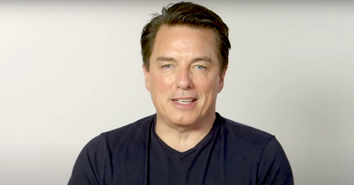 John Barrowman speaking to camera