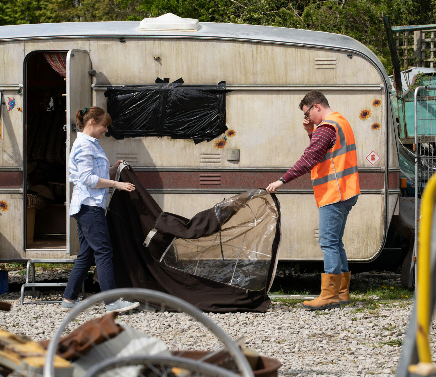 Emmerdale Lydia smiles as she and Vinny do up the old caravan