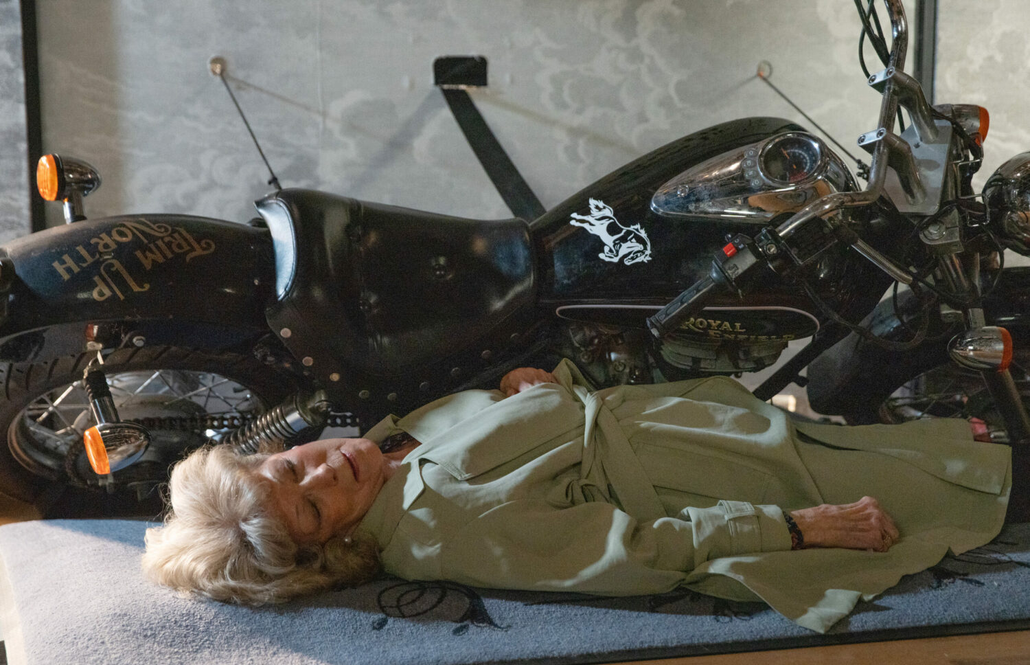 Audrey led unconscious next to a motorbike in Corrie