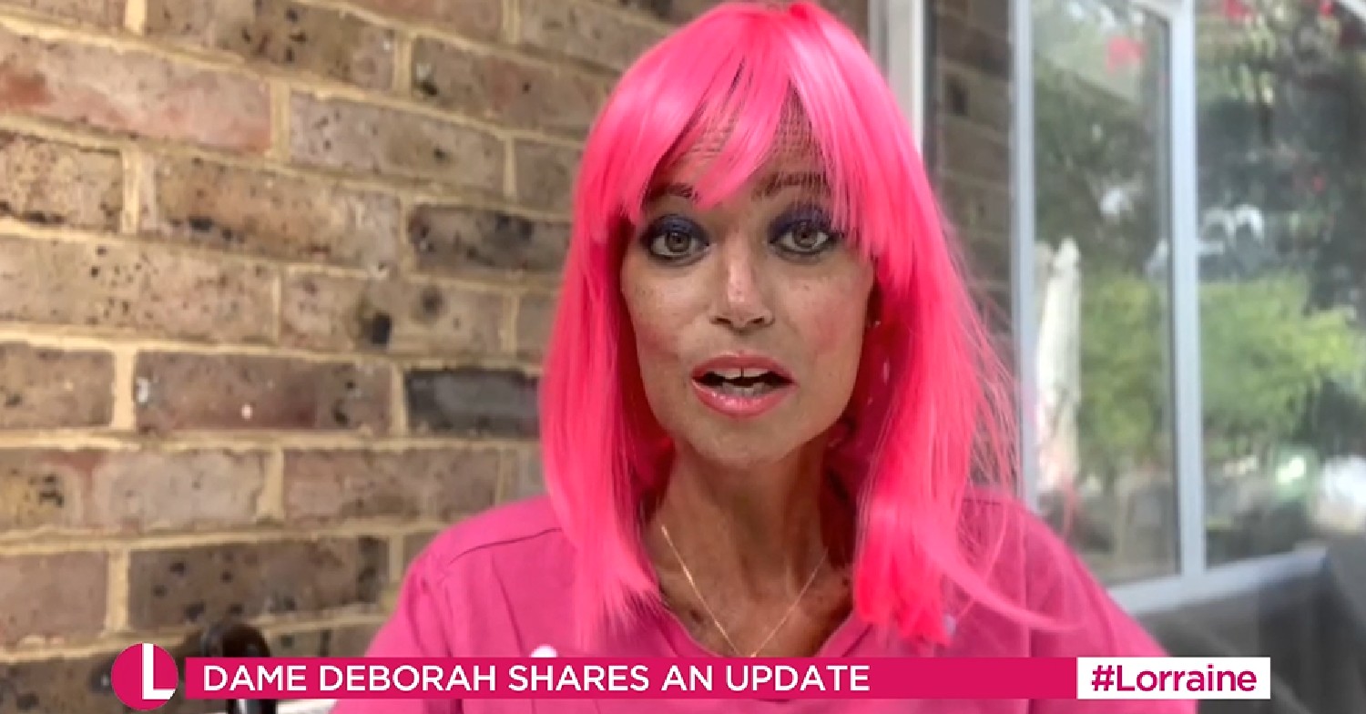 Deborah James wearing pink wig speaking to the camera on Lorraine