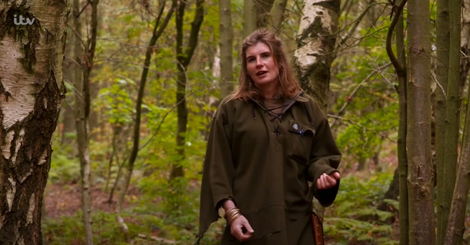 Amanda Owen stood in a forest while reporting for This Morning