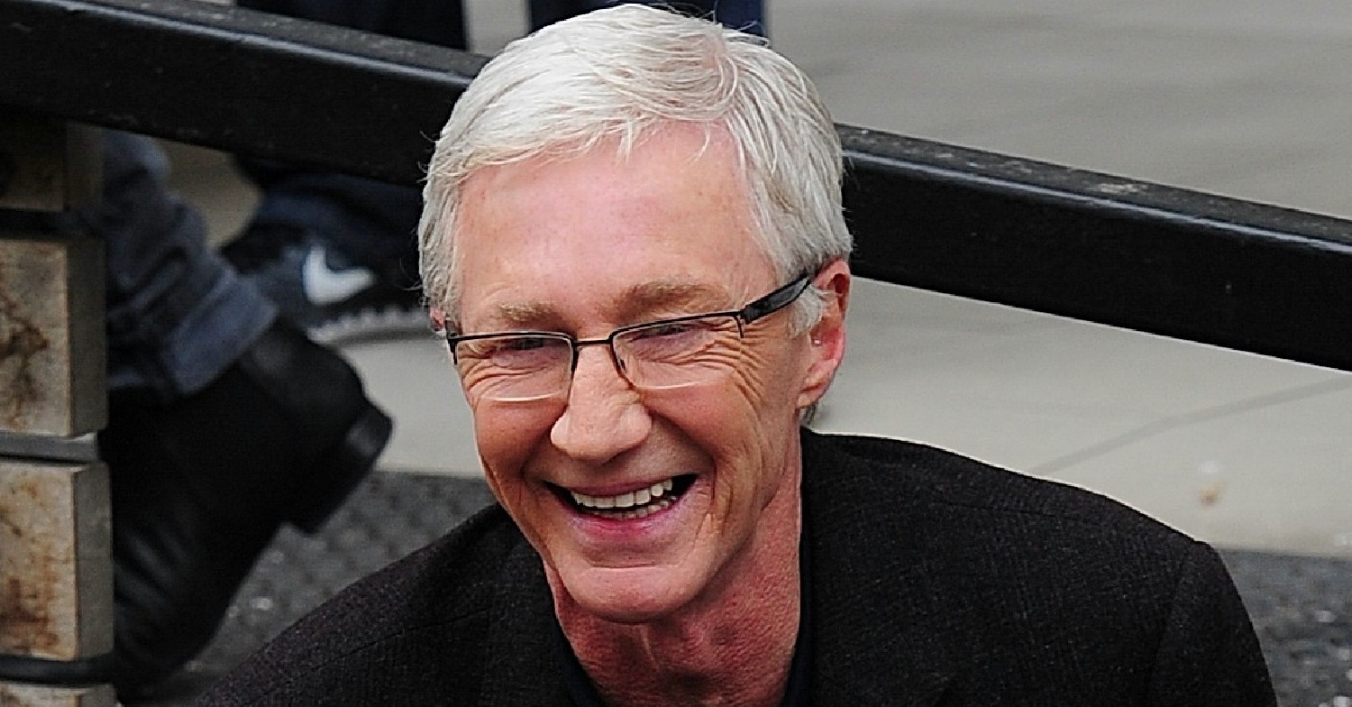 Paul O'Grady smiles at cameras outside ITV Studios