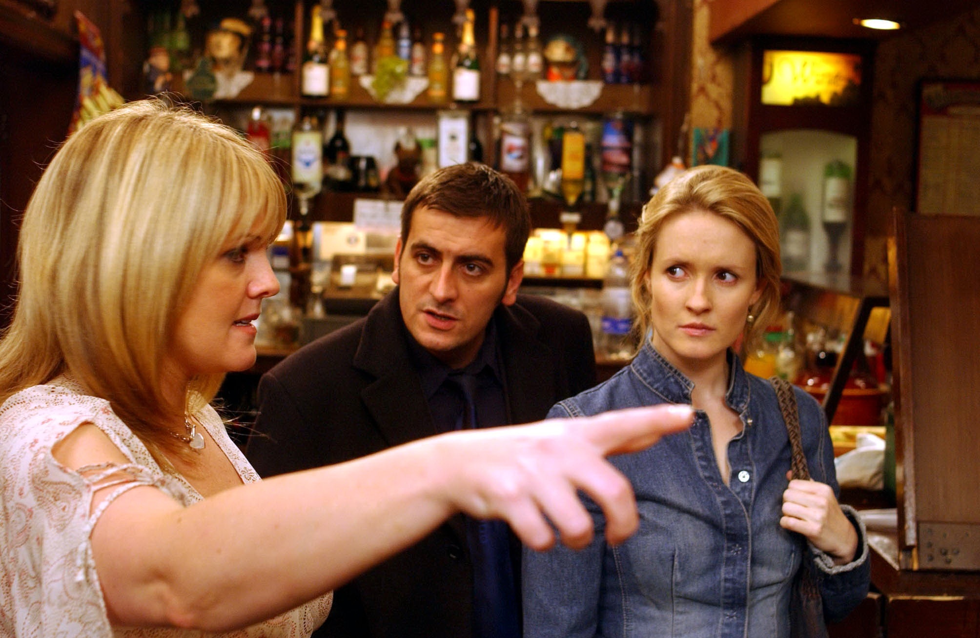 Peter Barlow looks shocked as his two wives, Shelley and Lucy, come face to face