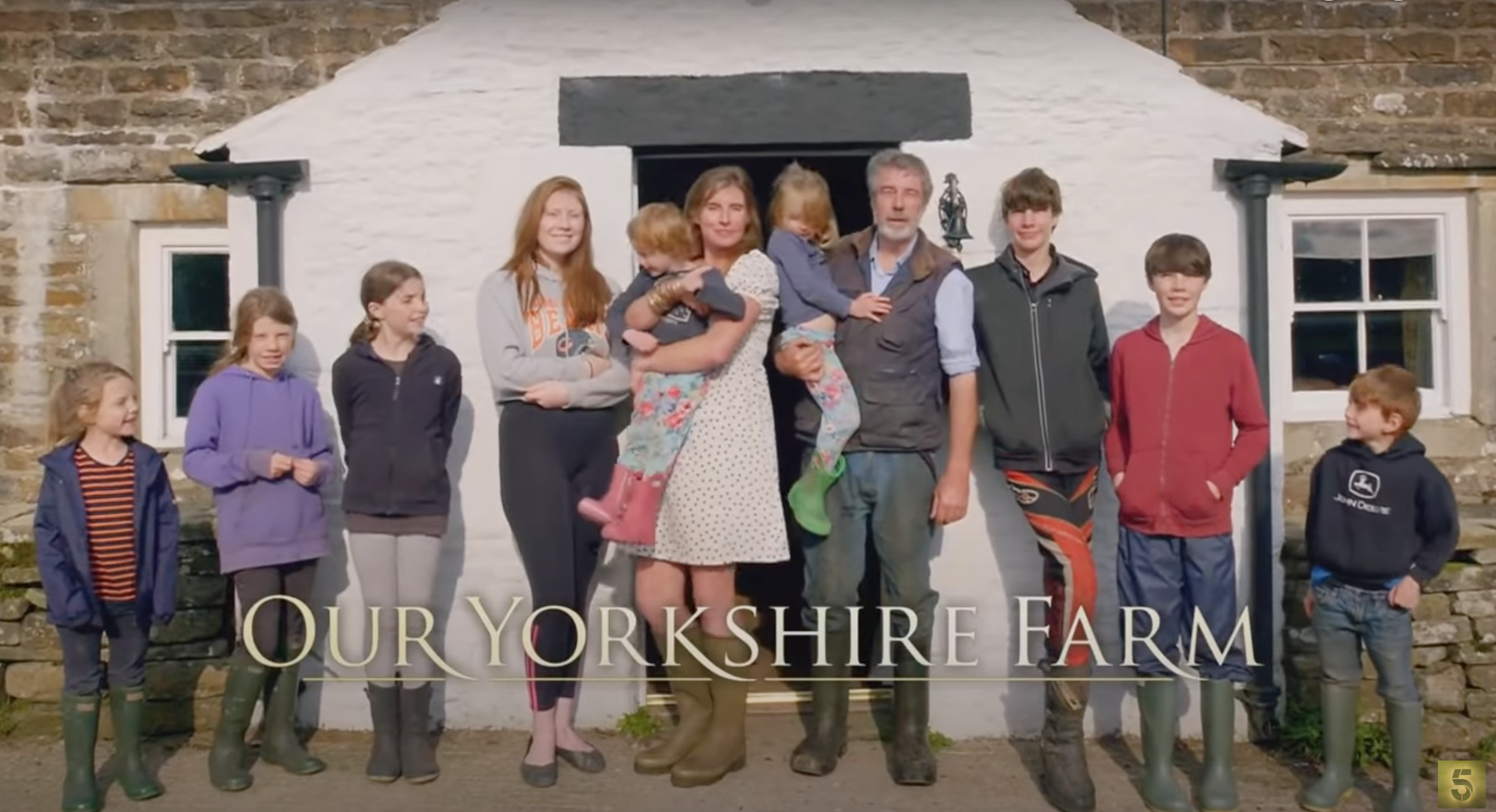 Amanda and Clive Owen lined up with all their kids