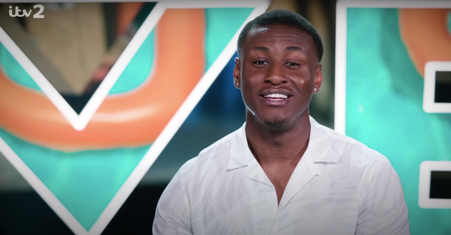 Sheriff Lanre smiling on Love Island