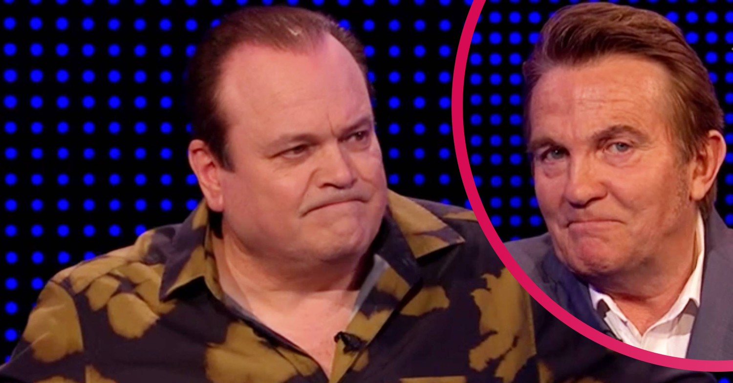 Shaun Williamson smiles as Bradley Walsh pulls a face on The Chase