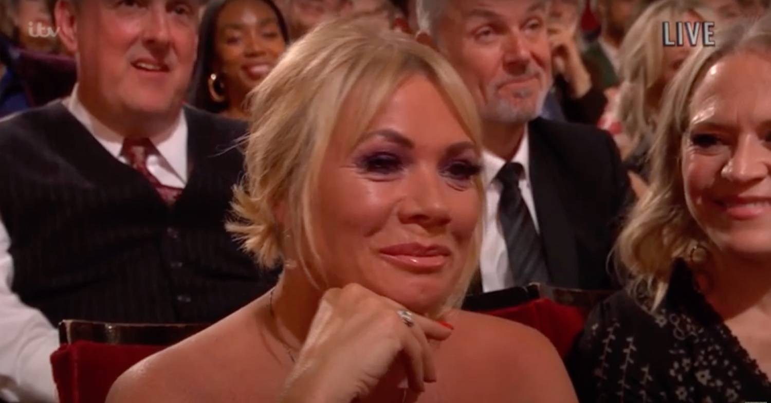 EastEnders star Letitia Dean smiles at the British Soap Awards