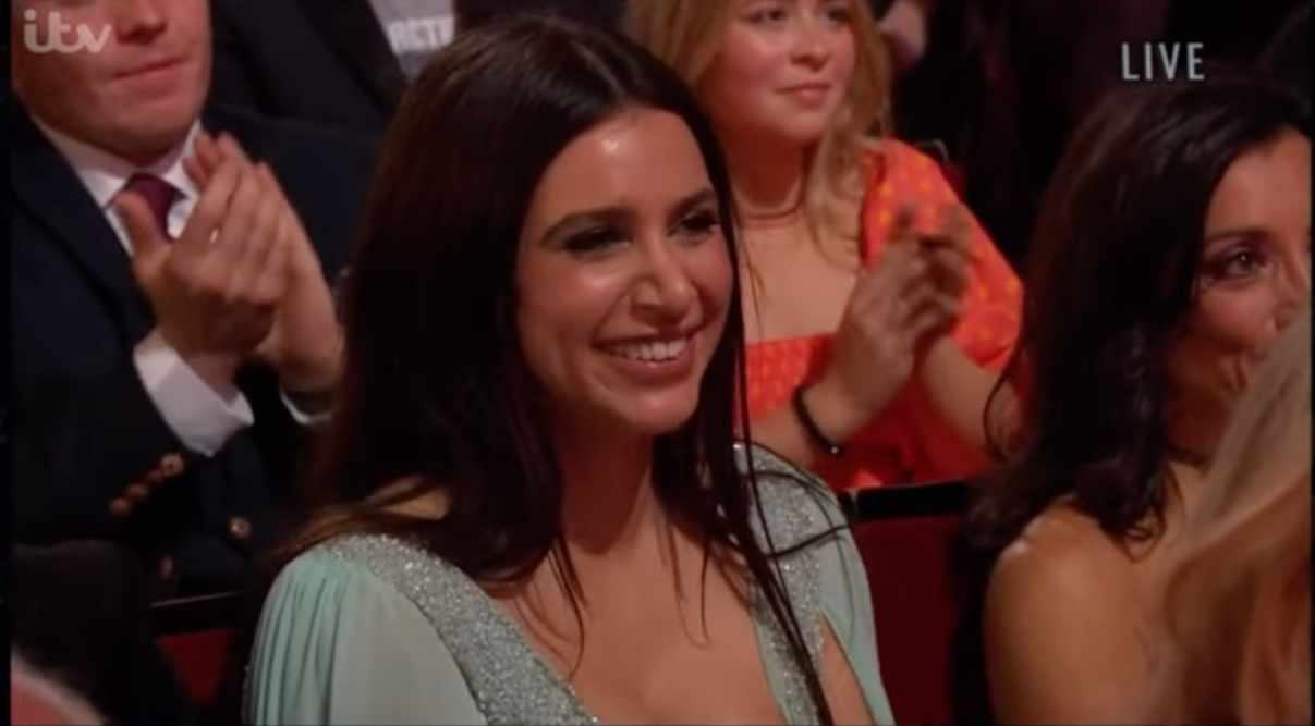 Paige Sandhu at the Soap Awards in a mint green dress smiling