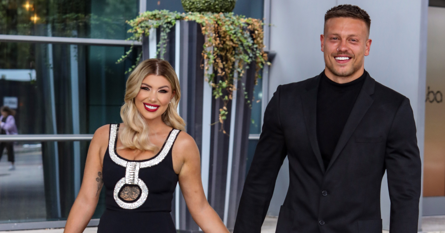 Alex and Olivia Bowen walk hand in hand