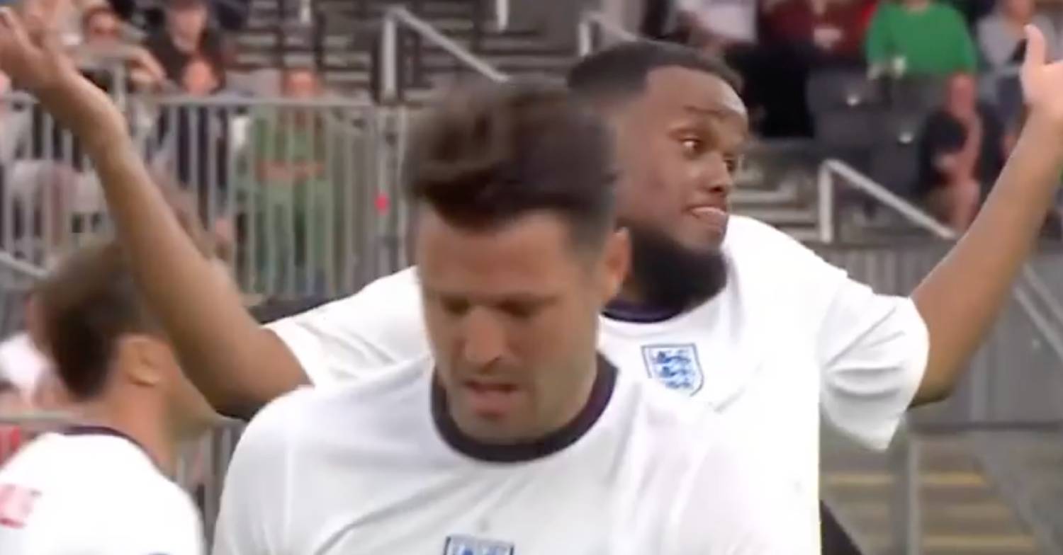 Soccer Aid player Mark Wright prepares to take a penalty as Chunkz shrugs