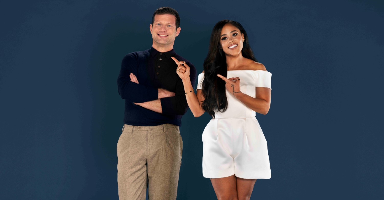 Alex Scott and Dermot O'Leary smiling on Soccer Aid