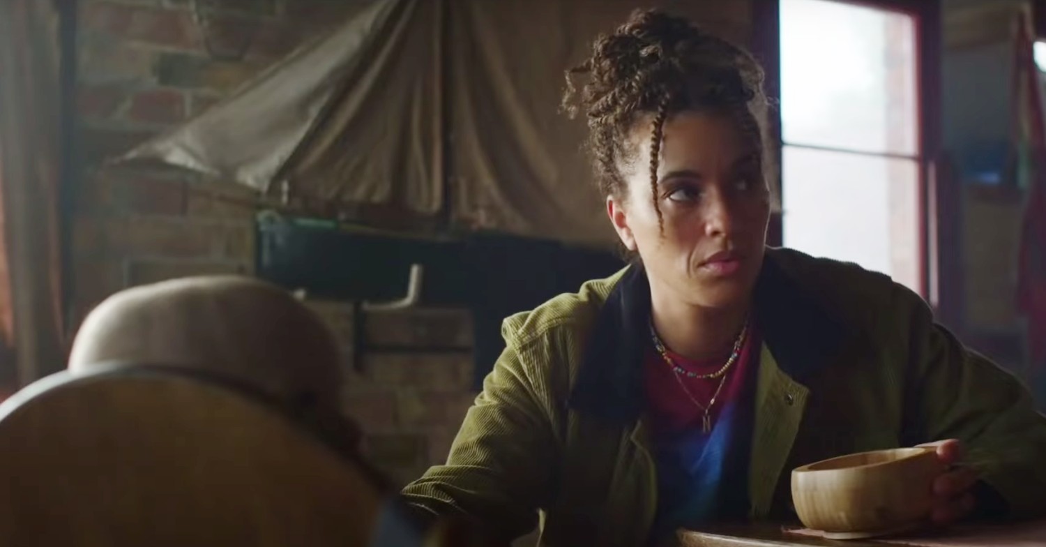 Michelle De Swarte feeding a baby on The Baby