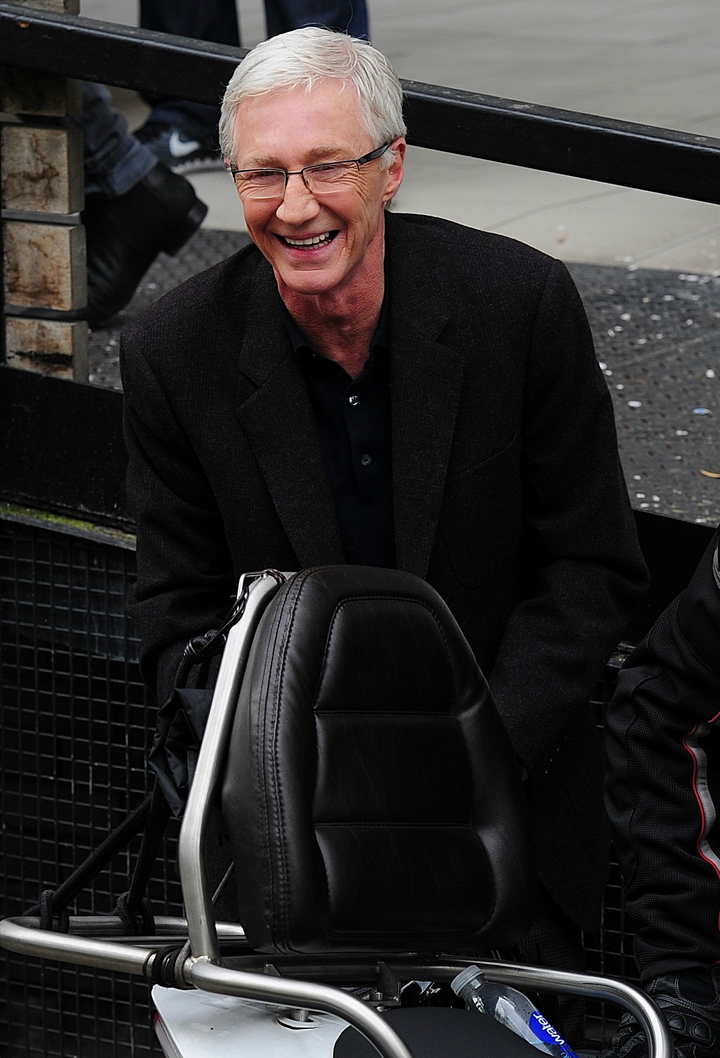 Paul O'Grady smiles outside ITV Studio