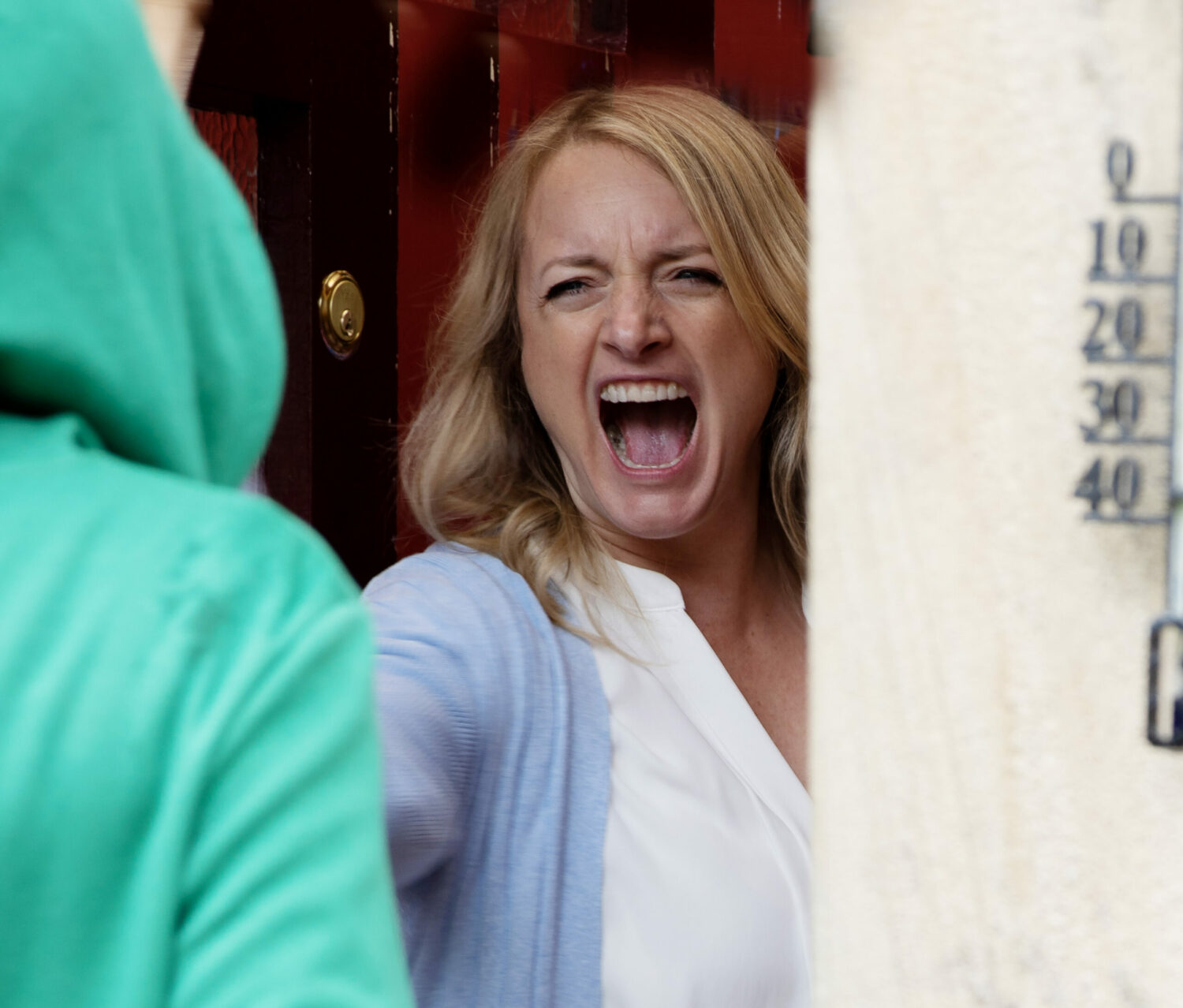 Nicola screams as she answers the door in Emmerdale