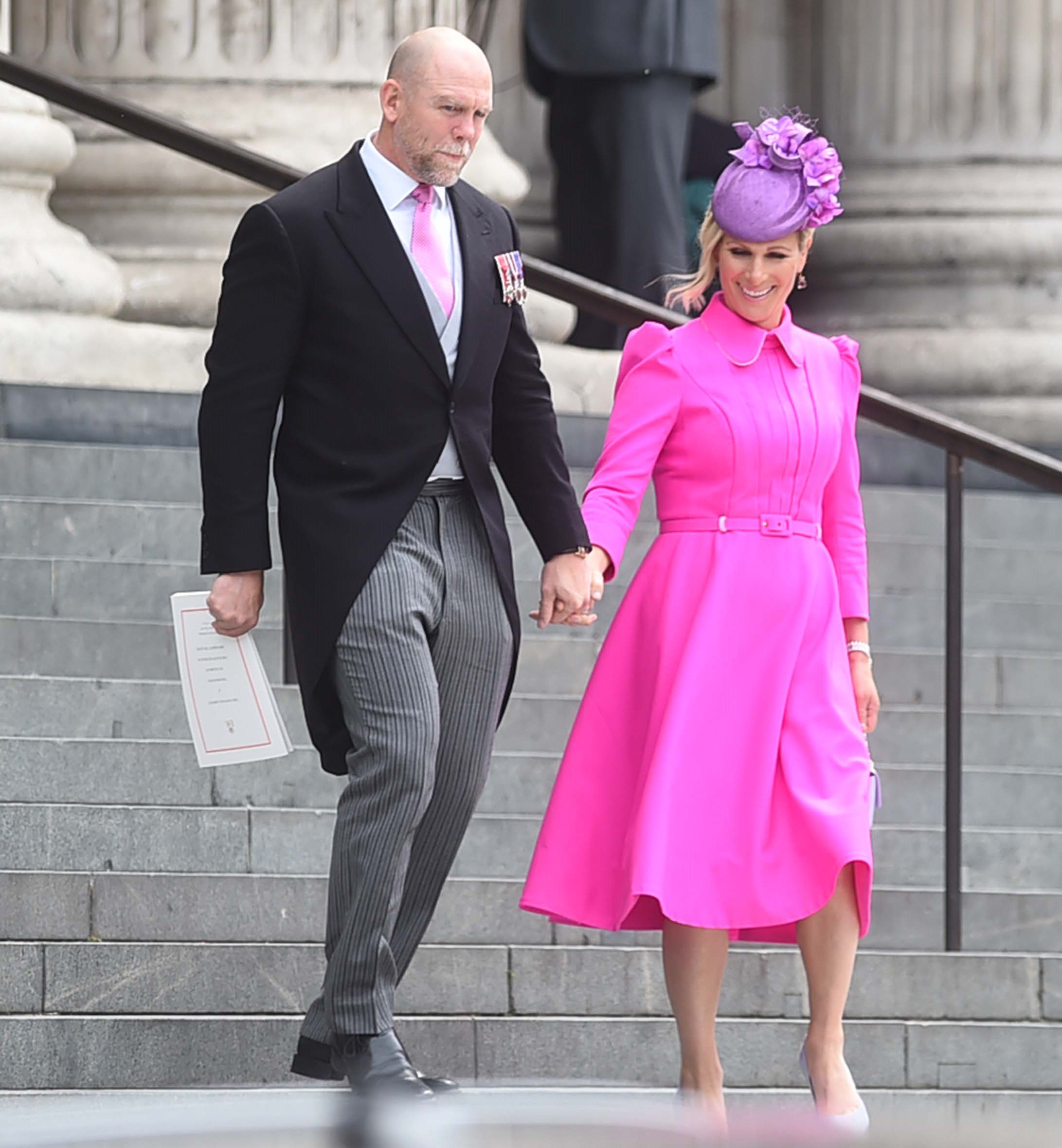 Mike Tindall holding hands with wife Zara at Jubilee service