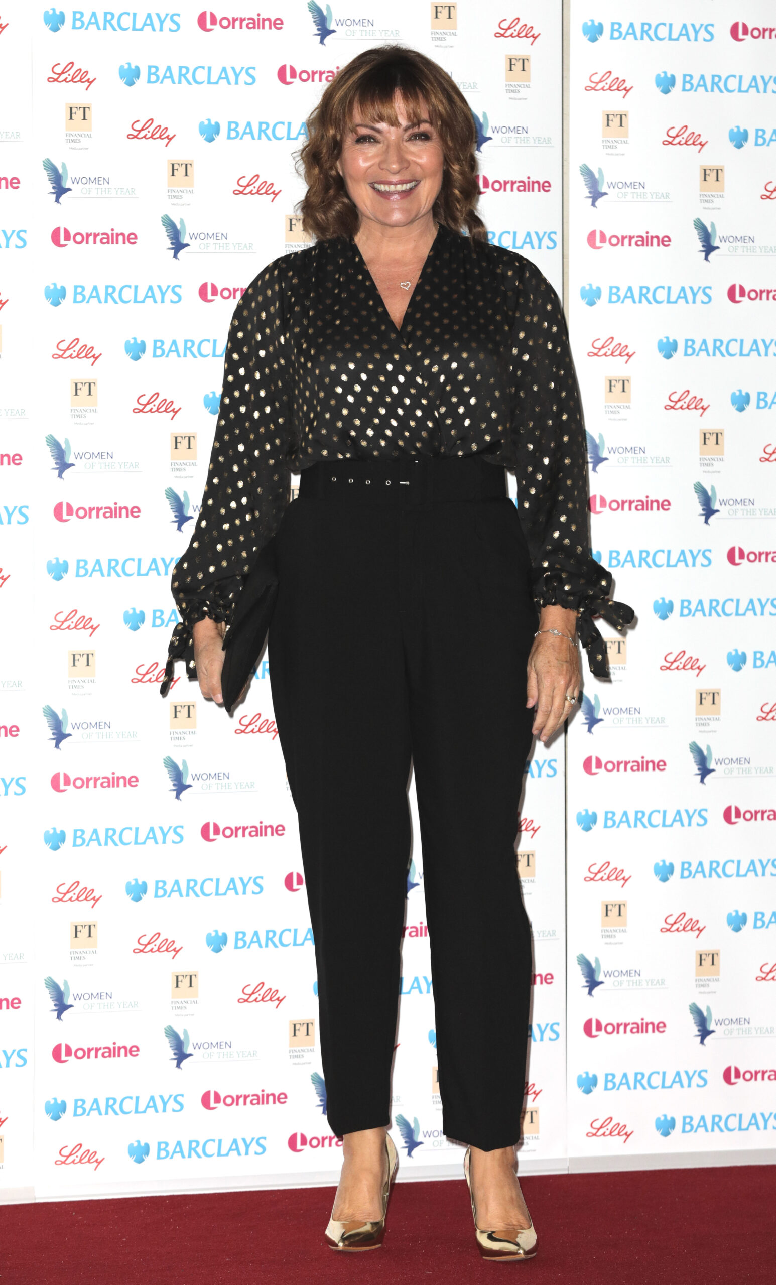 Age-defying Lorraine Kelly smiling on the red carpet