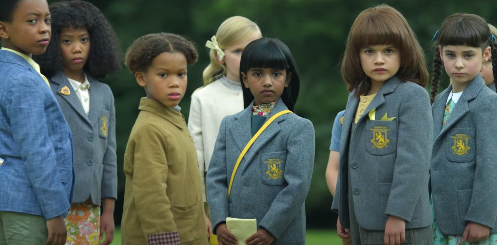 The Midwich children looking behind them on The Midwich Cuckoos