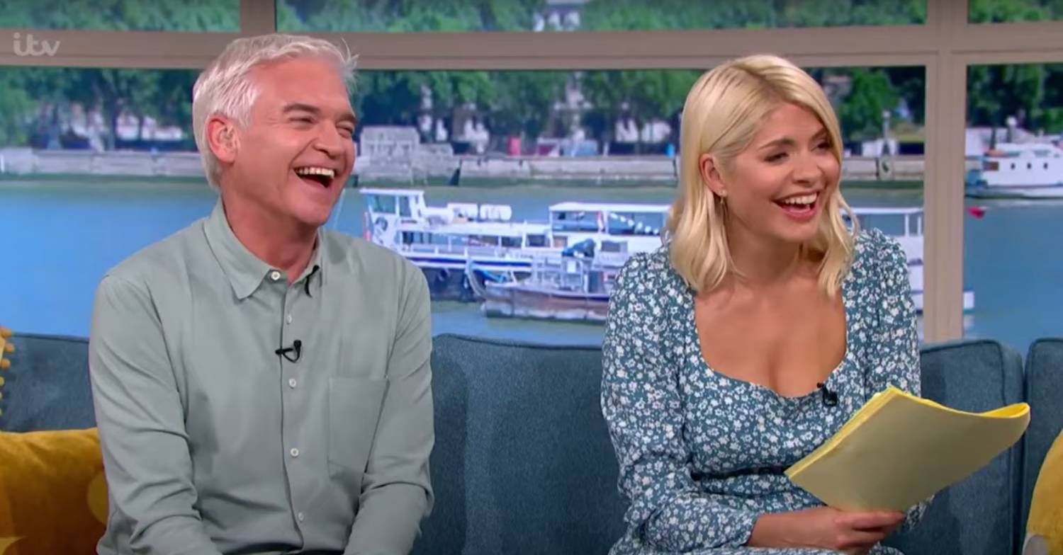 Holly Willoughby laughs on This Morning in blue floral dress today