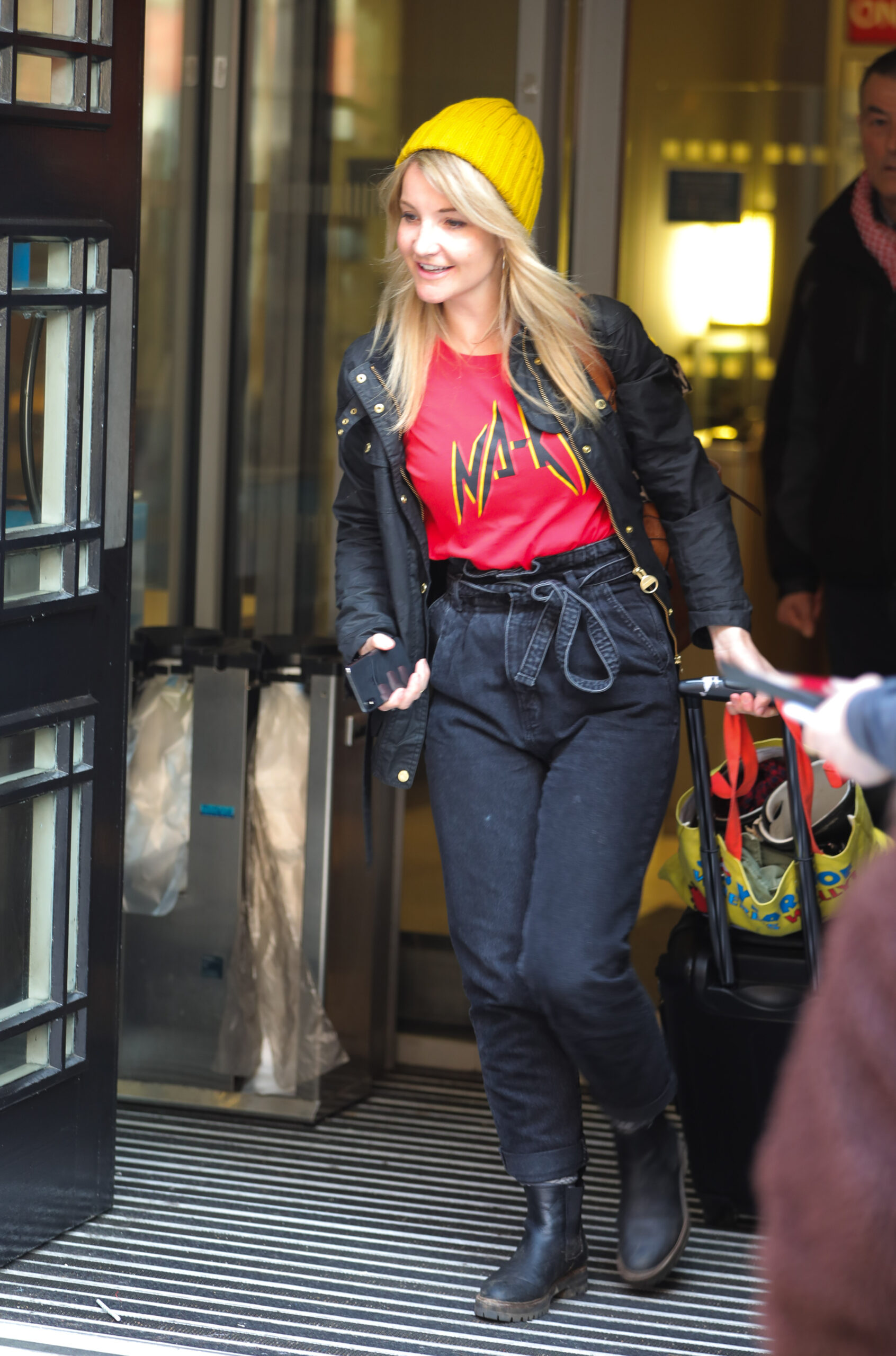 Helen Skelton in a yellow beanie hat smiling