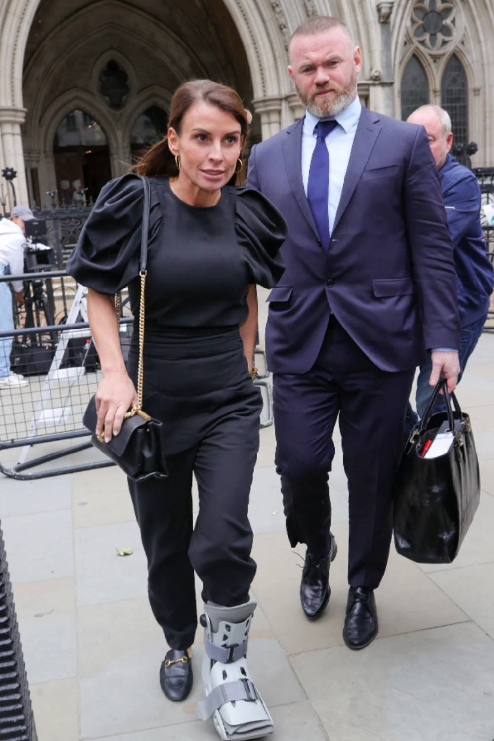 Coleen Rooney and Wayne Rooney leave court