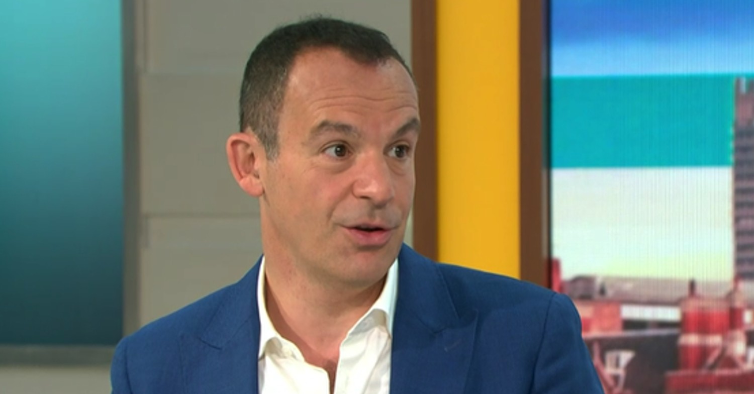 Martin Lewis on GMB chatting in a navy suit