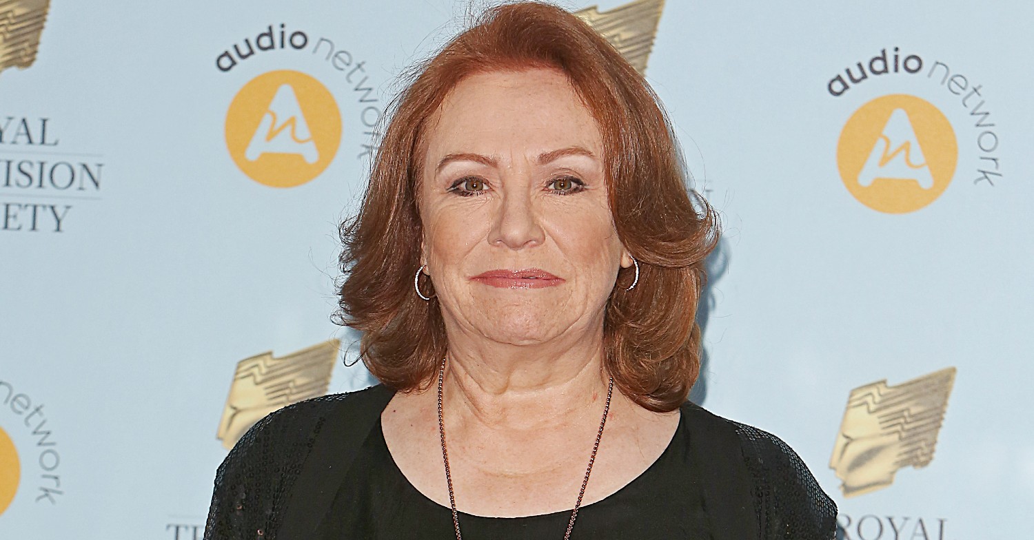 Corrie star Melanie Hill smiling at an event (Credit: Splash)