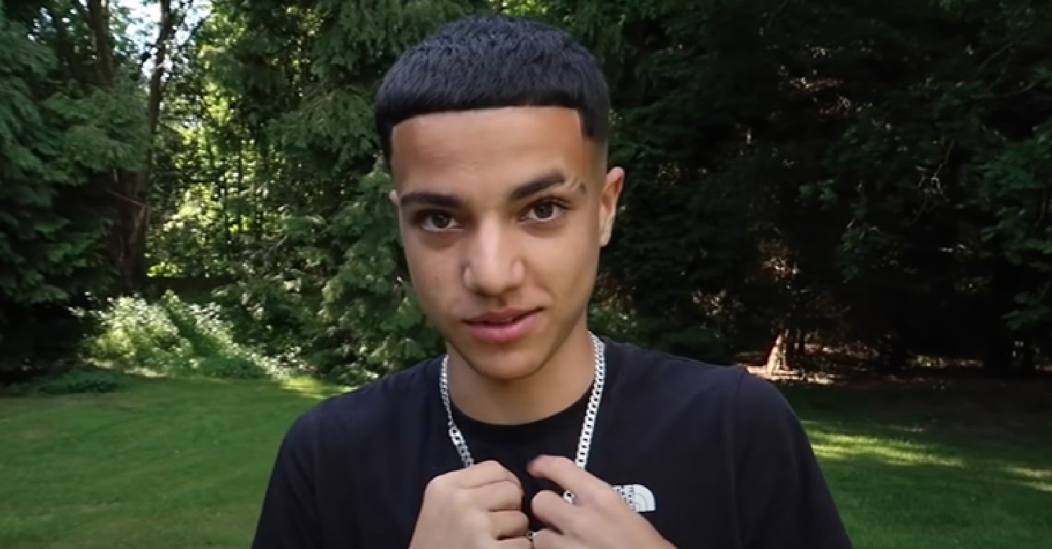 Peter Andre's son Junior holding chain while speaking to camera