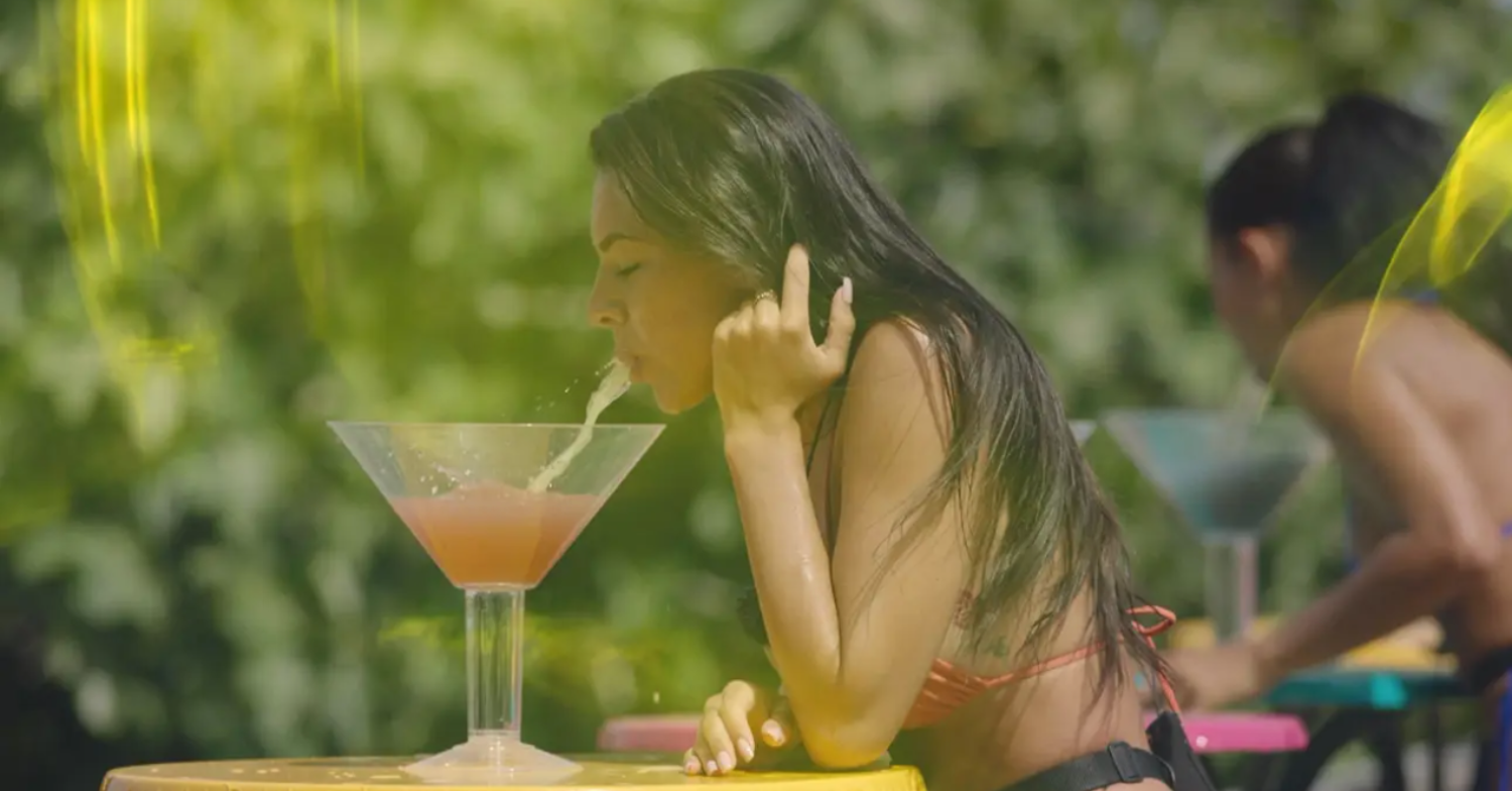 Paige spits drink into large glass on Love Island 2022