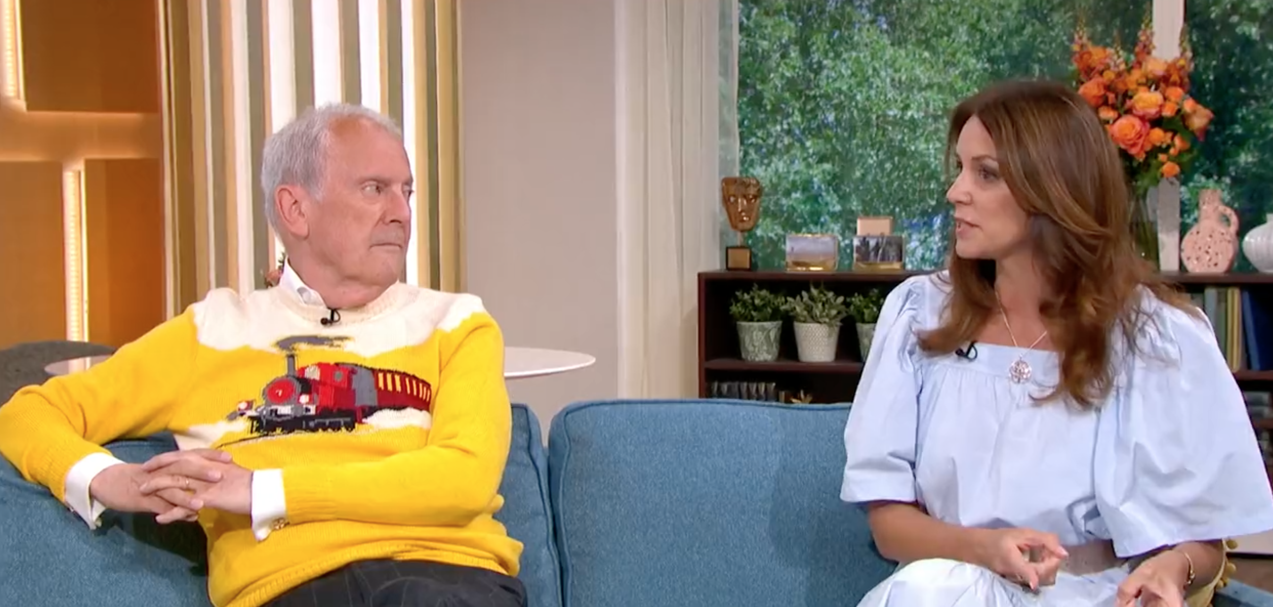 Gyles Brandreth scowling at Beverley Turner