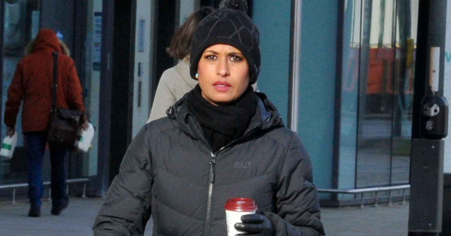 Naga Munchetty walking with a coffee