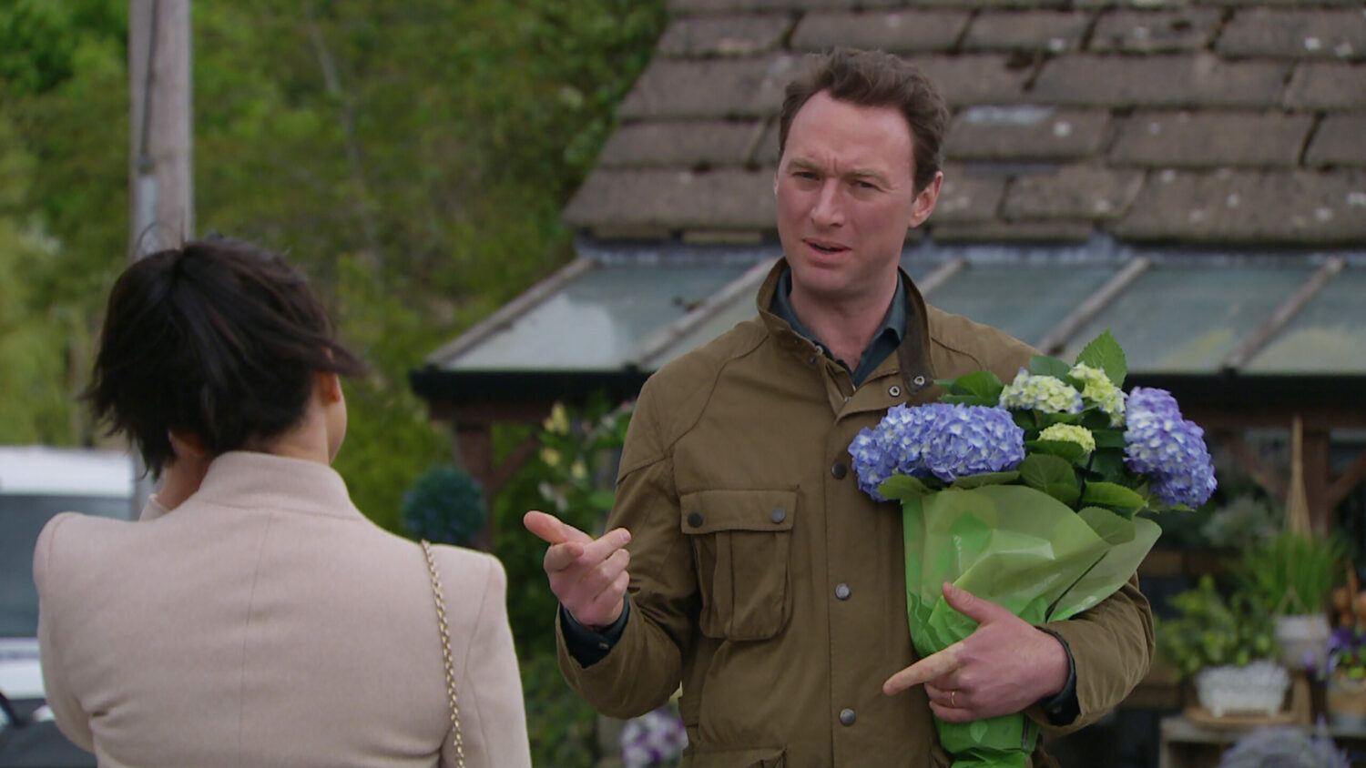 Liam holding flowers Emmerdale