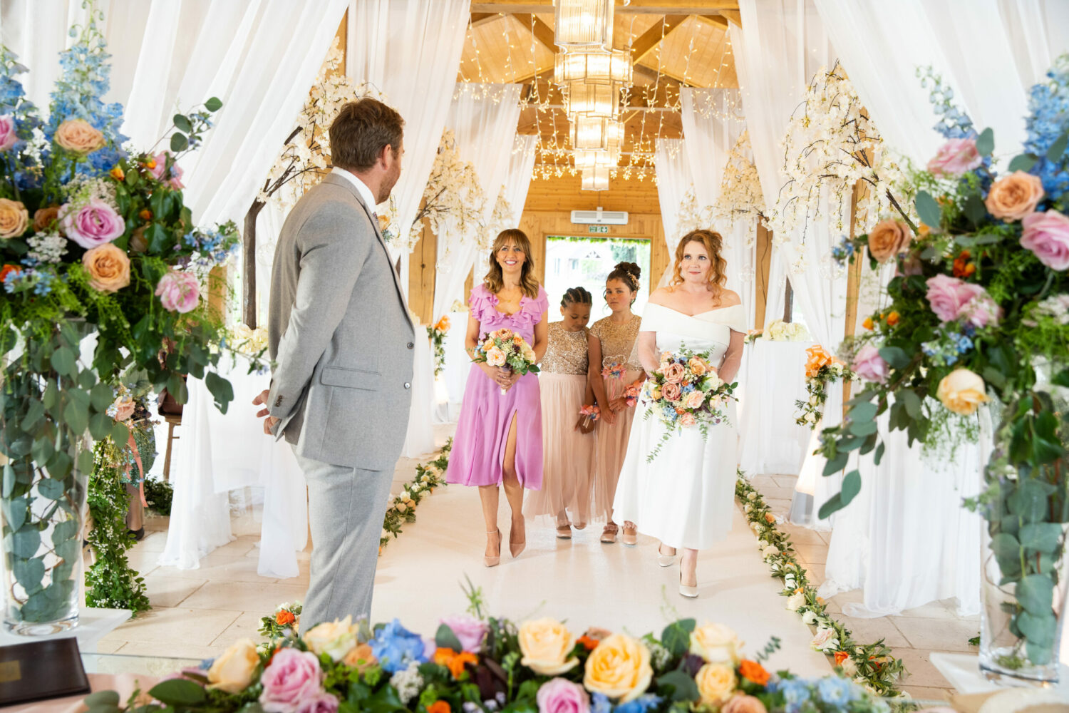 Maria walking down the aisle with Maria Ruby and Hope behind her Coronation Street