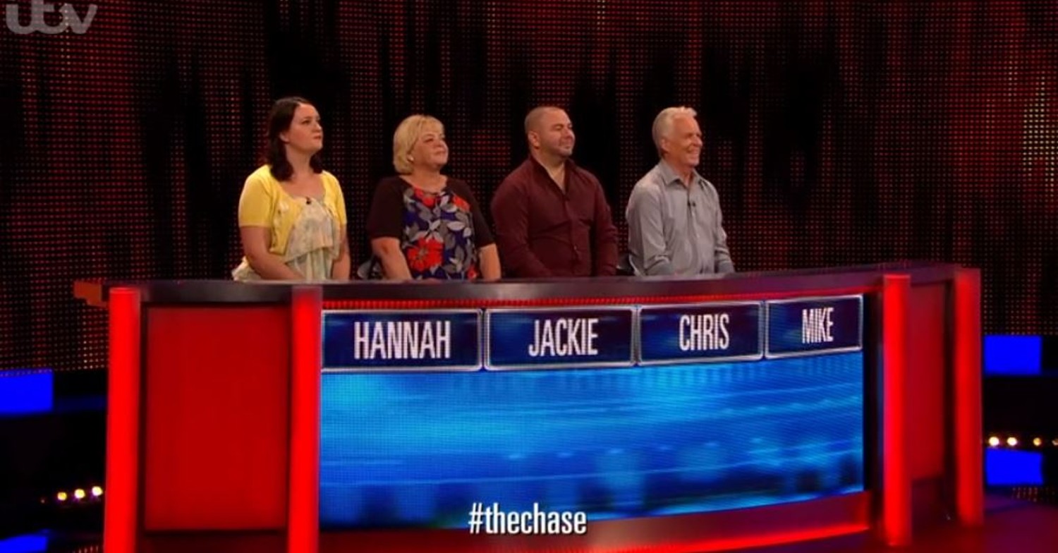 The Chase contestants stood behind their podium 