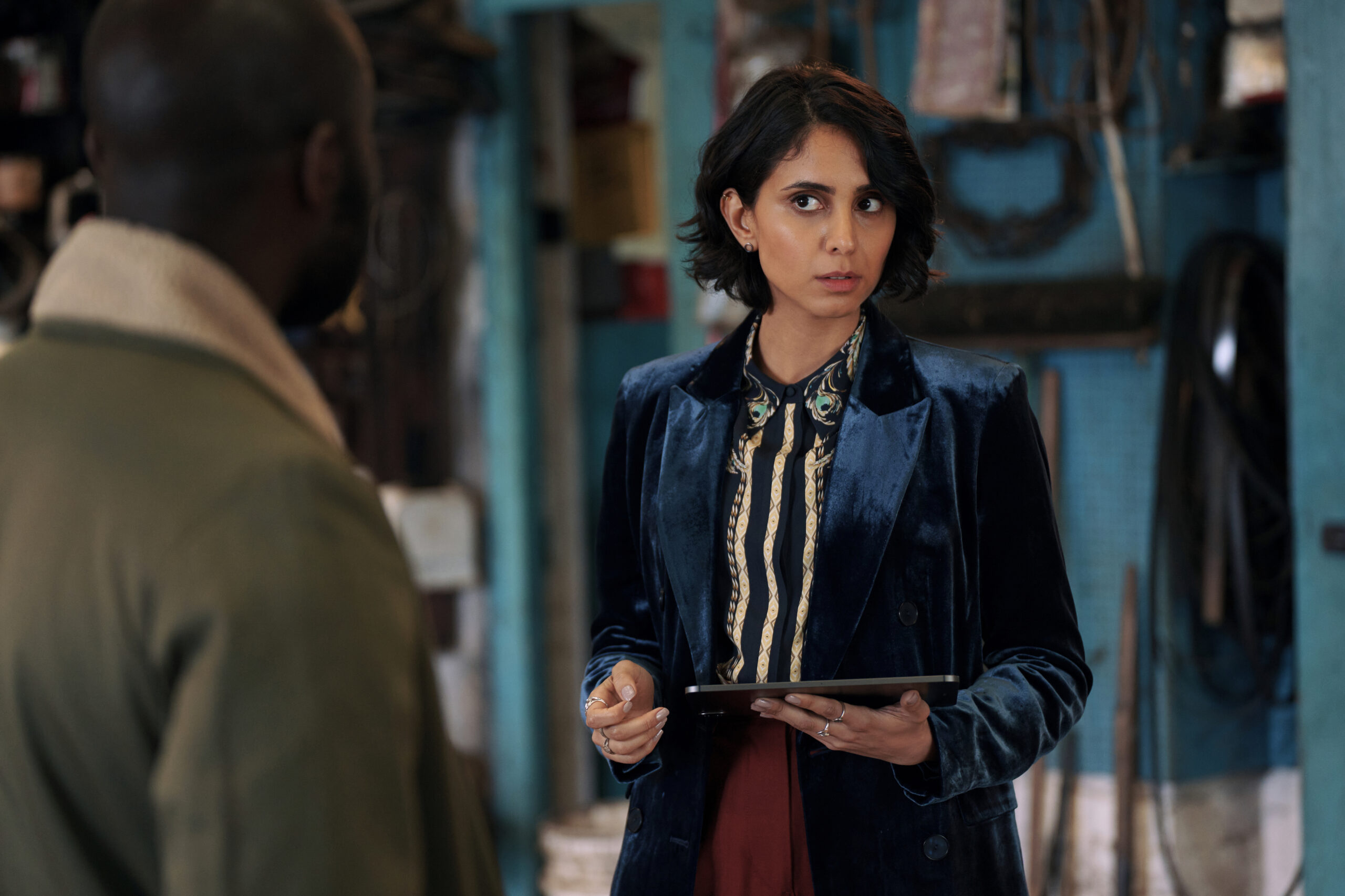 Anjli Mohindra as Archie in The Lazarus Project