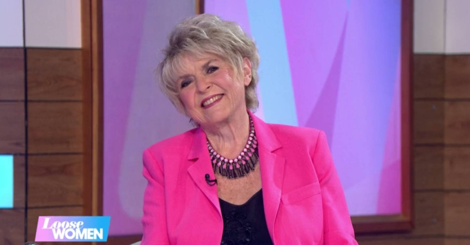 Gloria Hunniford beaming on Loose Women in pink blazer