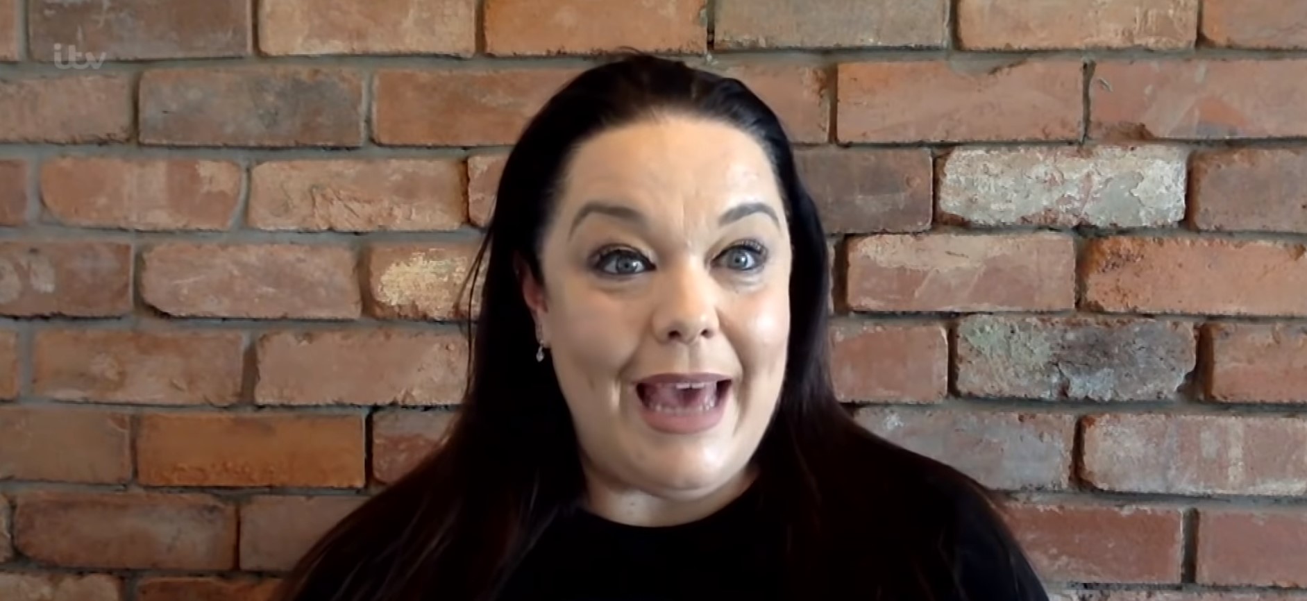 Lisa Riley smiles as she speaks on Loose Women