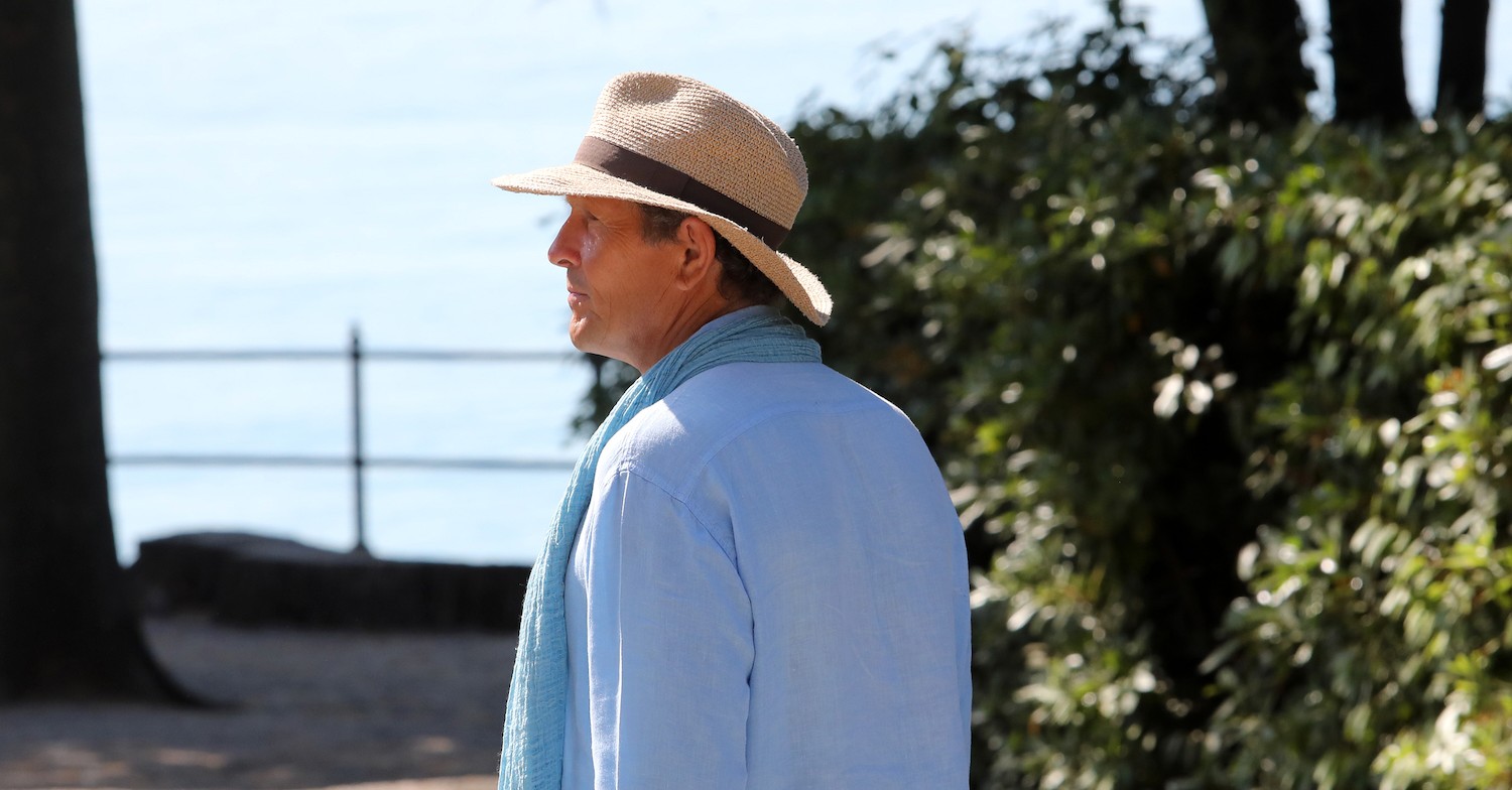 Monty Don blue shirt walking away from camera