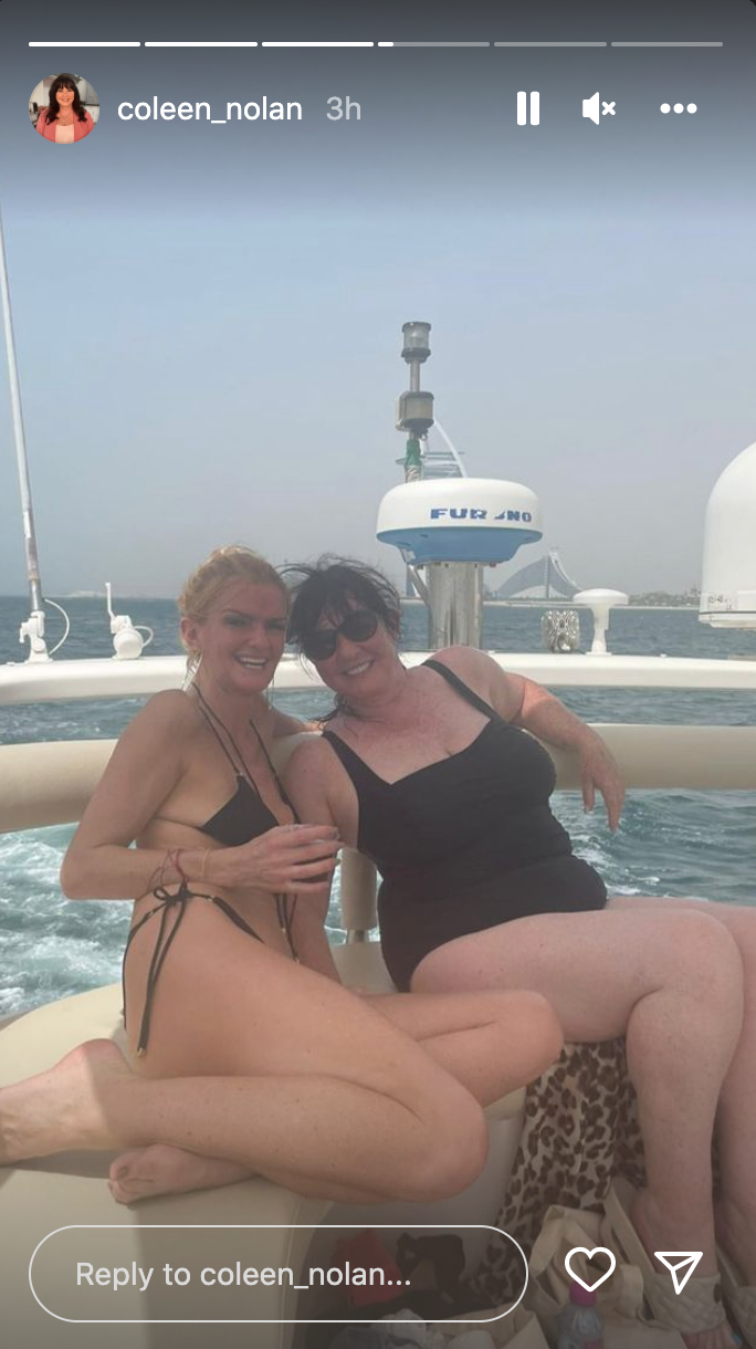 Coleen Nolan poses in black swimsuit on a boat on Instagram Stories