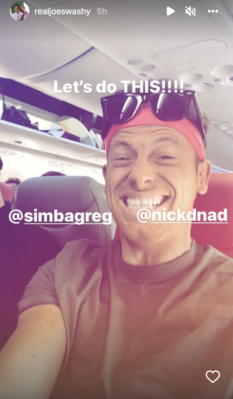 Joe Swash grinning on an airplane in his Instagram story