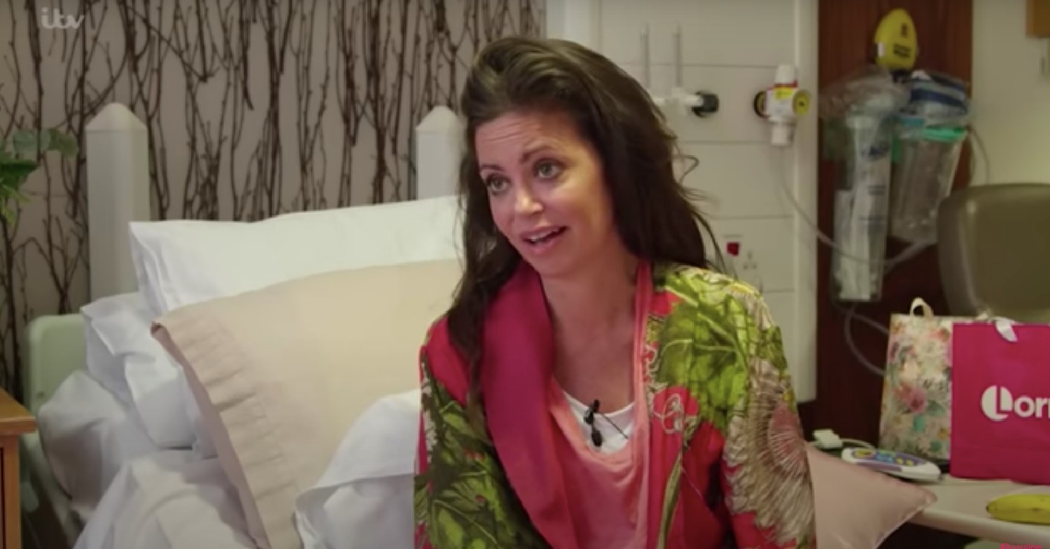 Deborah James in hospital being interviewed