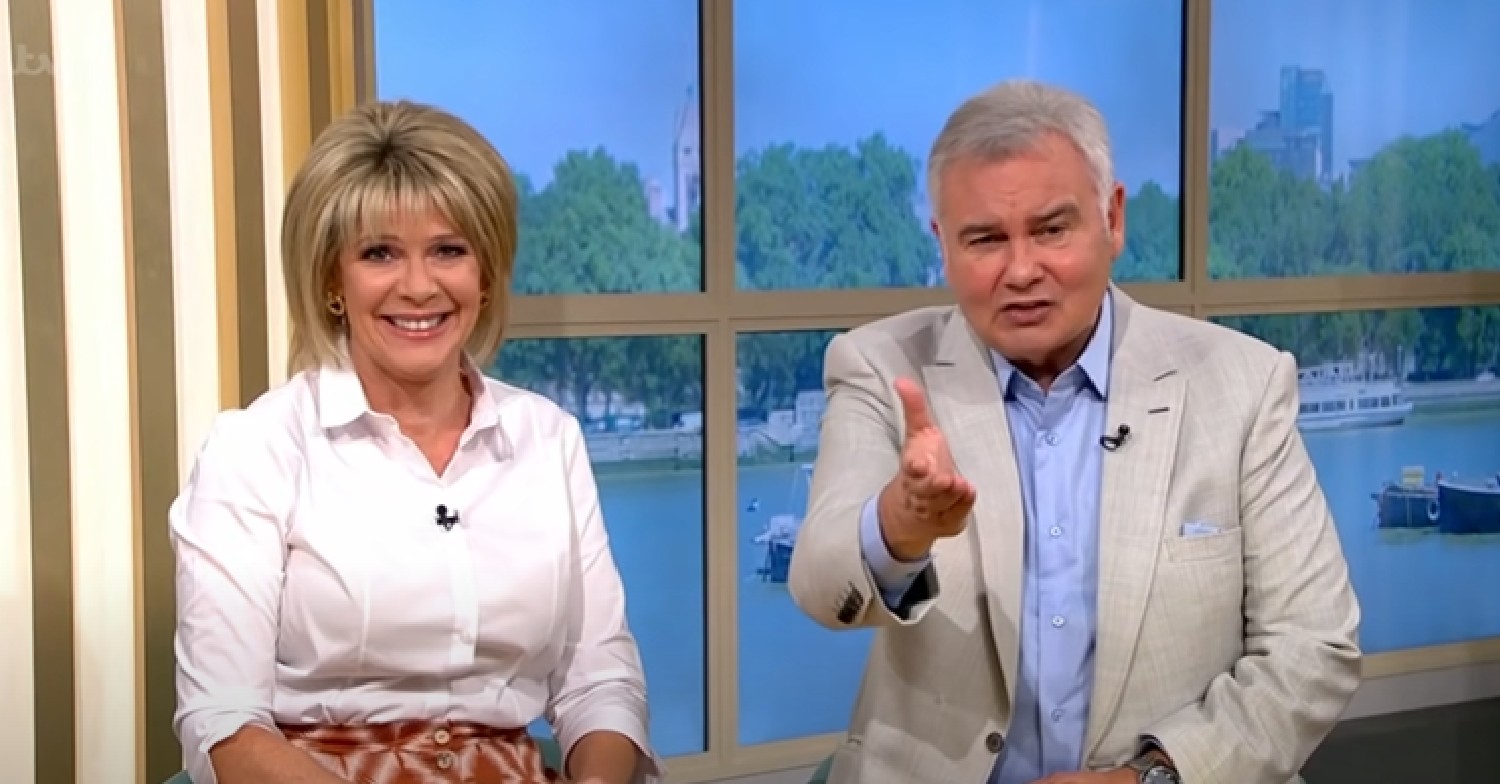 Ruth Langsford smiling as Eamonn Holmes talks to camera on This Morning