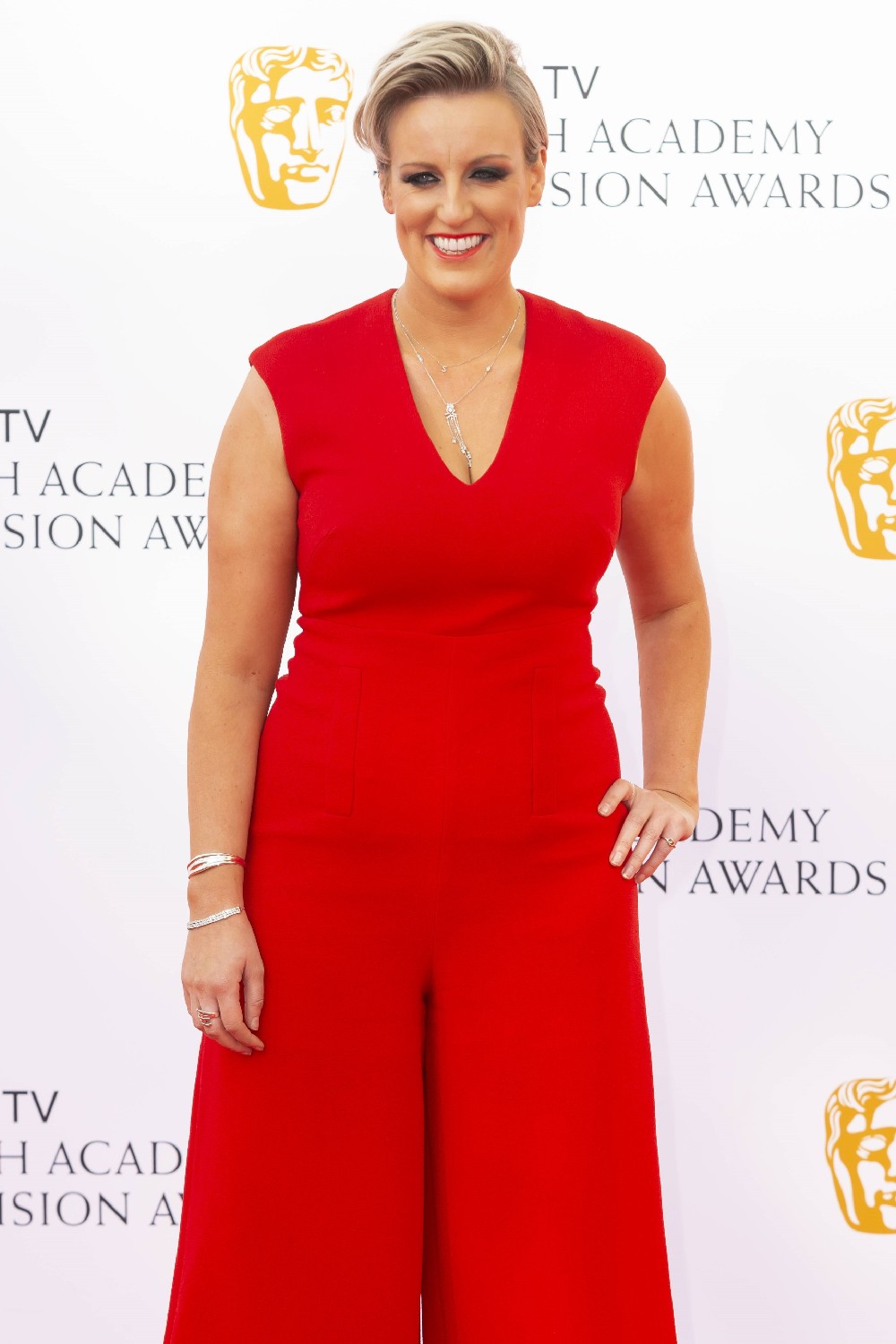 Steph McGovern in red jumpsuit at Virgin TV British Academy Television Awards