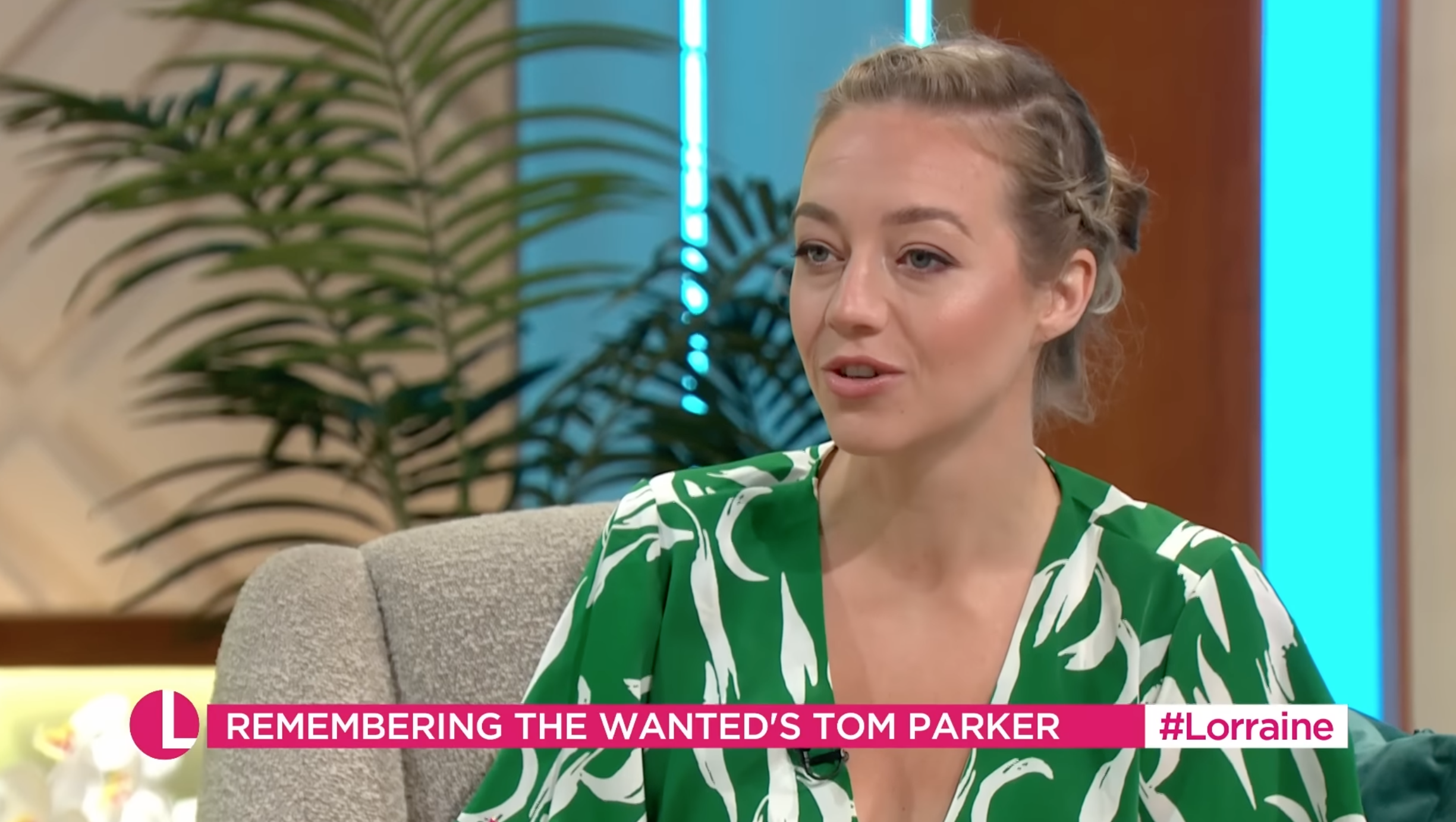 Kelsey Parker chatting on Lorraine wearing a green dress