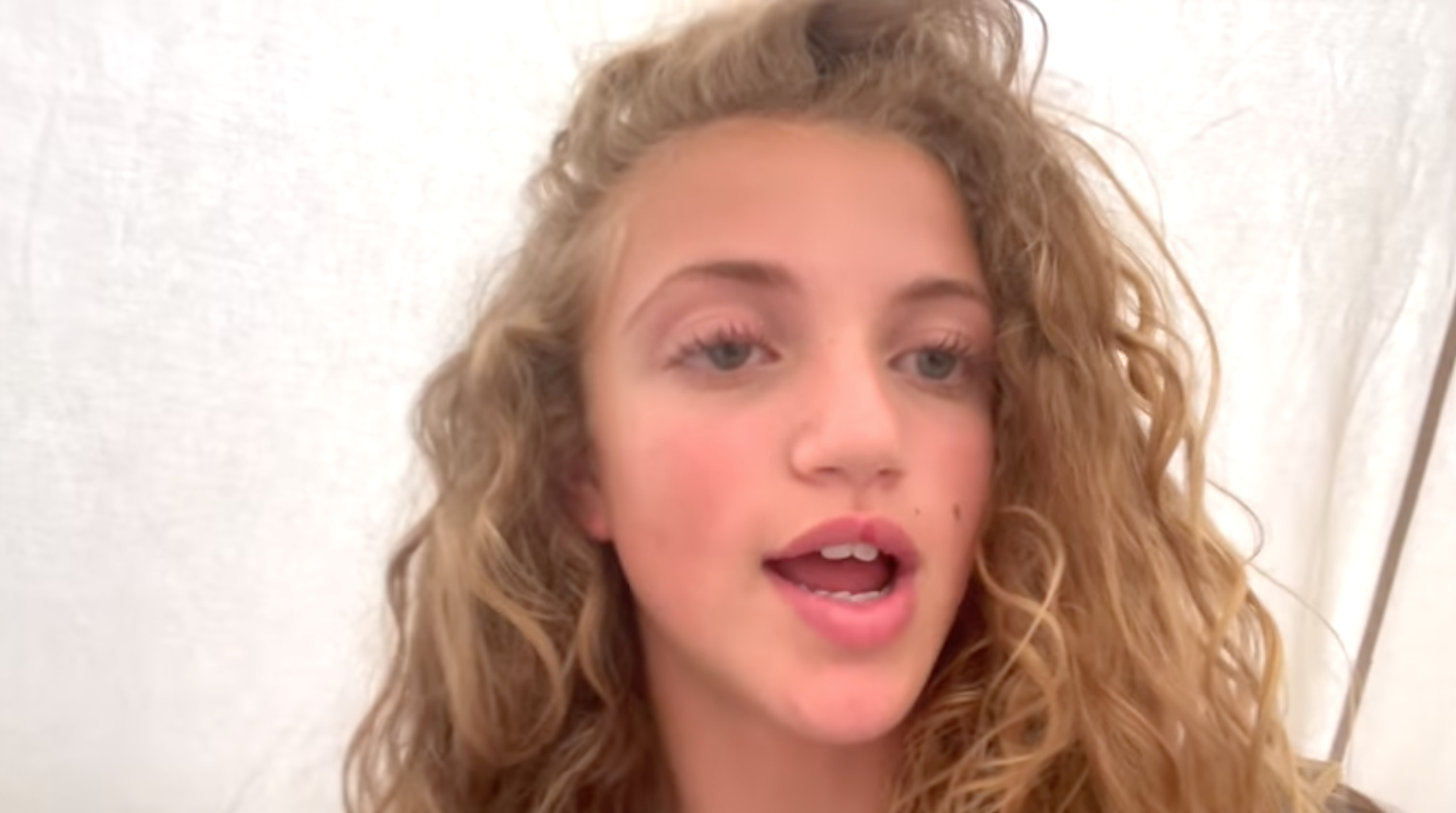 Princess Andre with curly blonde hair