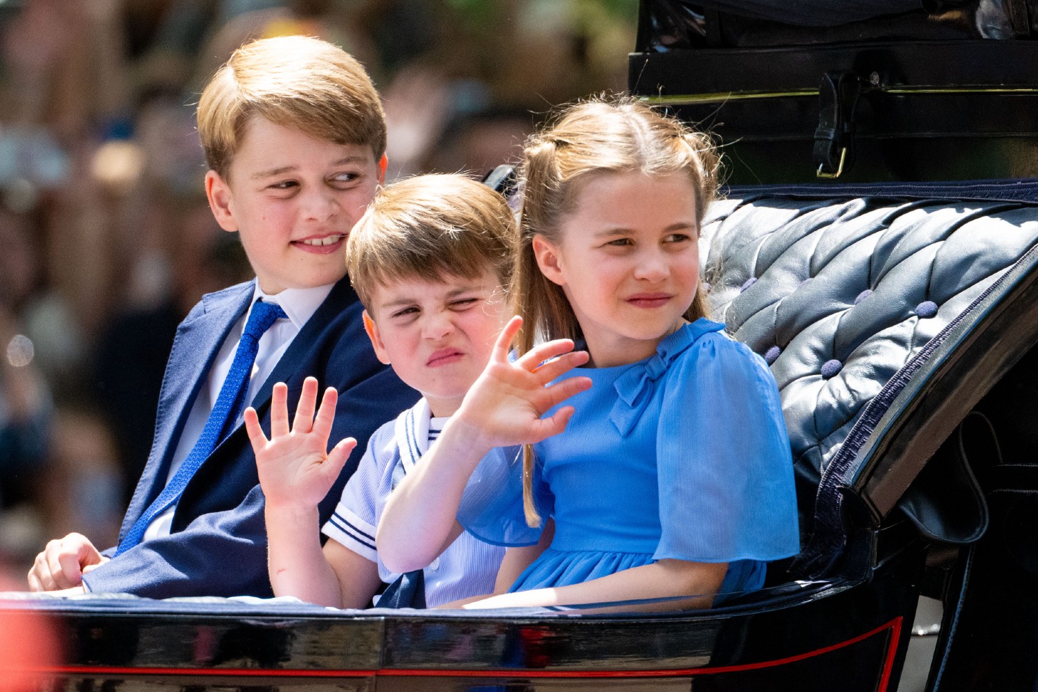 Prince George, Louis and Princess Charlotte waving at the Queen's Jubilee 