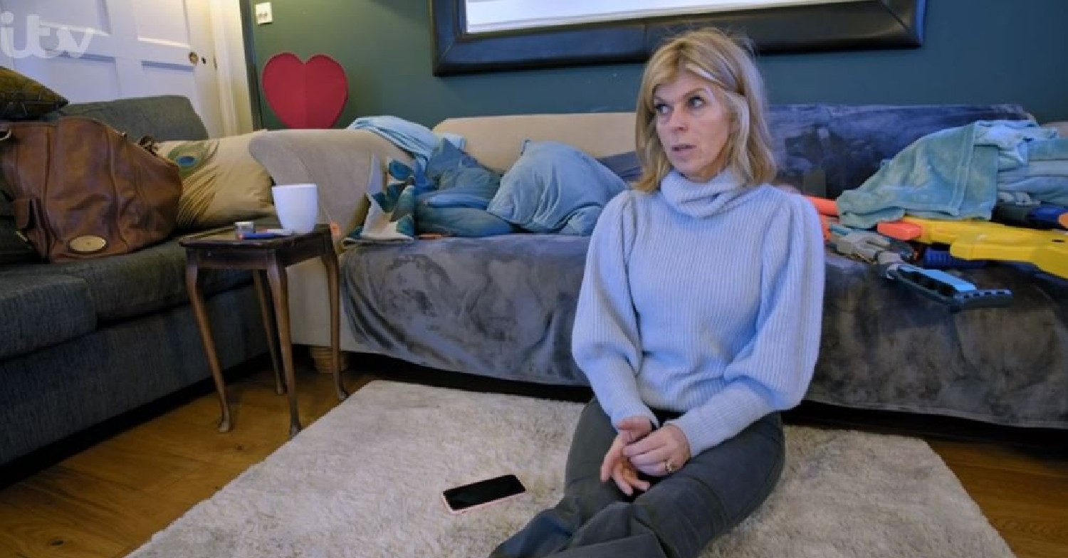 Kate Garraway sitting on the living room floor