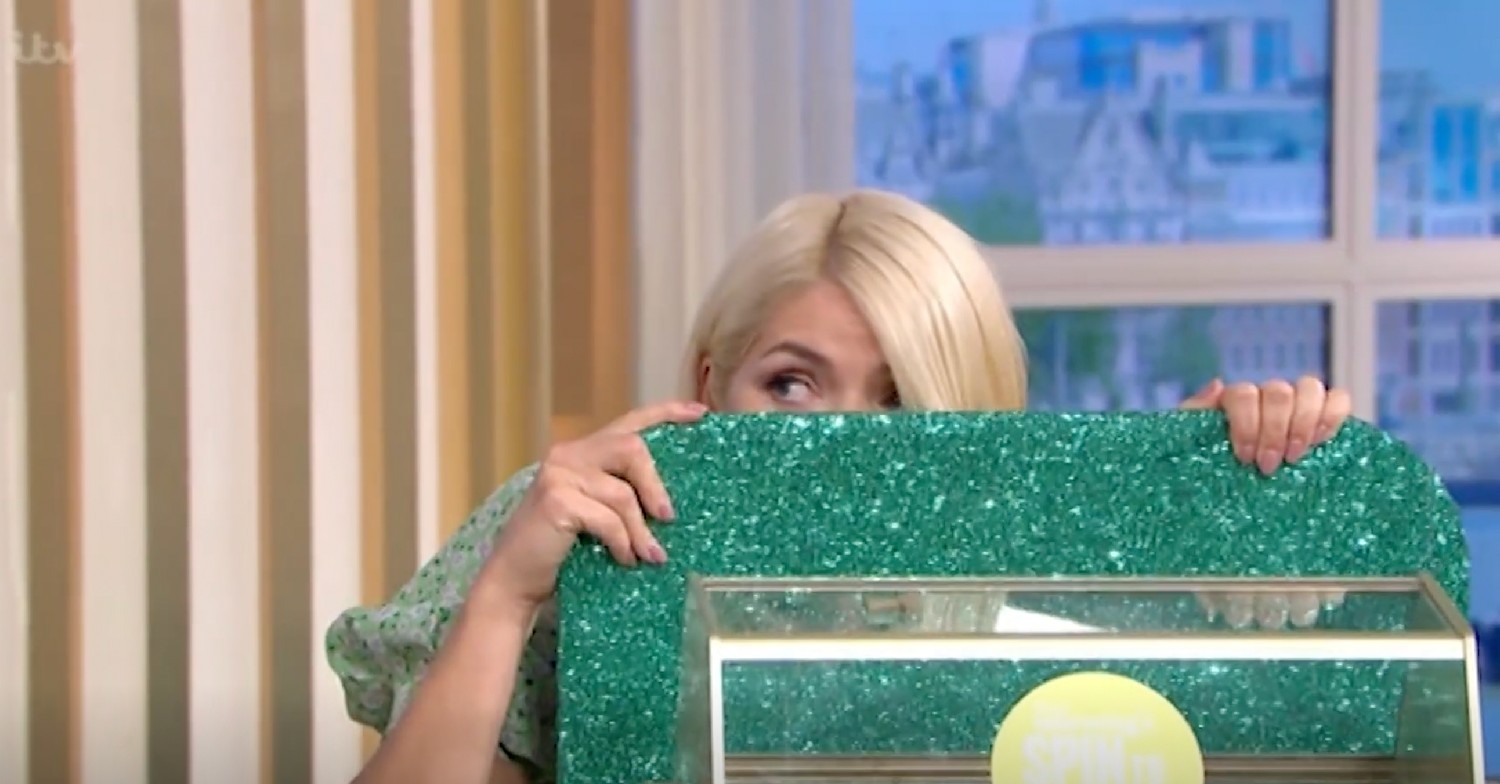 Holly Willoughby hiding behind the tombola on This Morning today
