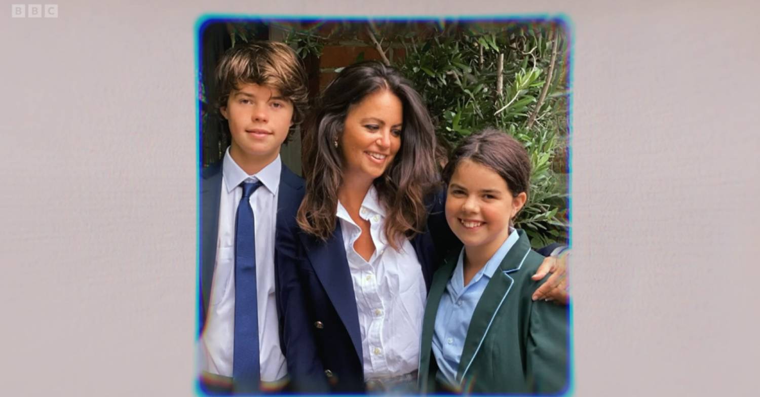 Deborah James looks at her daughter as she stands with her children